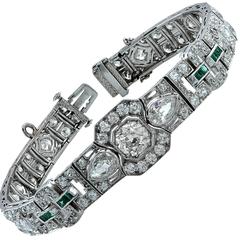 1920s 9.50 Carat Diamond Emerald Platinum Bracelet