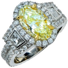 GIA Graded 2.42 Carat Yellow Diamond Engagement Ring
