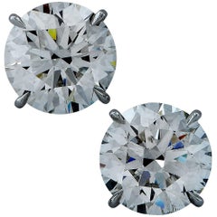 Vivid Diamonds GIA Graded 6.96 Carat Diamond Solitaire Earrings