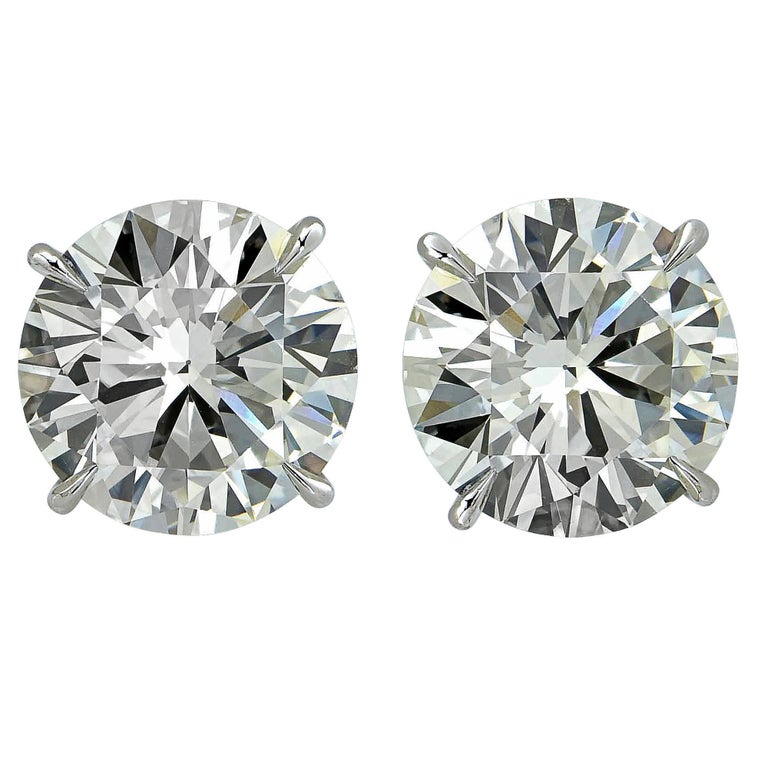 4.09 Carat Diamond Solitaire Stud Earrings For Sale
