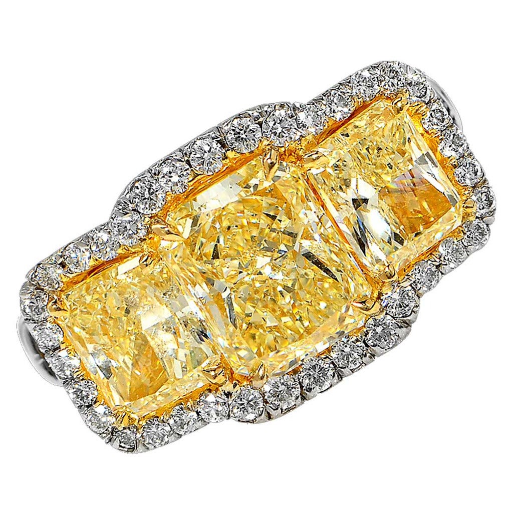 5 Carat Fancy Yellow Diamond Platinum Three-Stone Ring