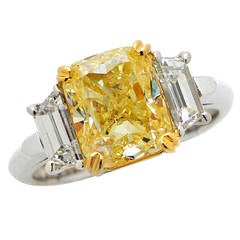 3.52 Carat GIA Cert Fancy Yellow Diamond Platinum Three Stone Ring