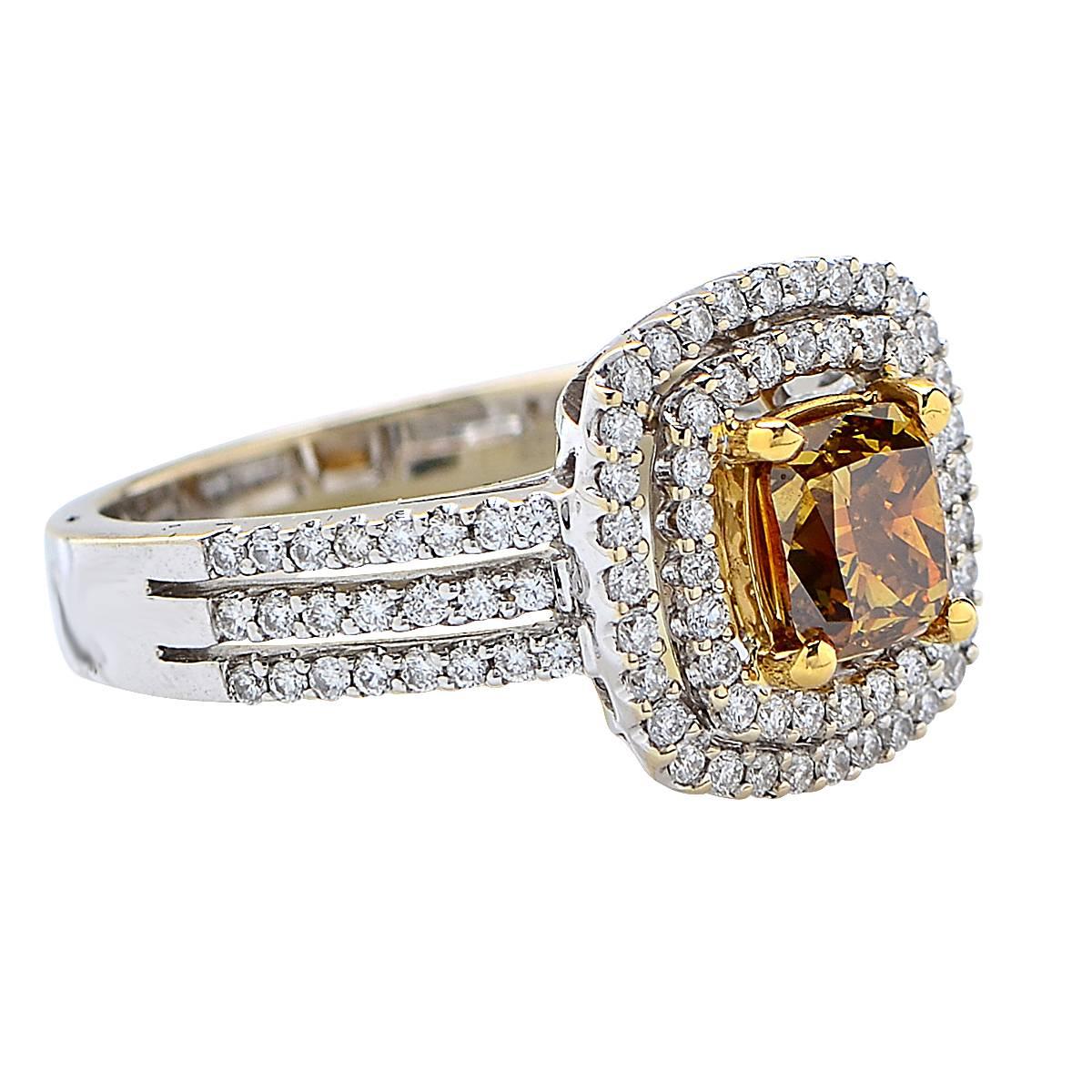 Stunning engagement ring crafted in 18 Karat Yellow and White Gold, showcasing a GIA Certified Fancy Deep Brownish Yellow radiant cut diamond weighing 1.23 carats adorned by 102 round brilliant cut diamonds weighing approximately .59 carats total, G