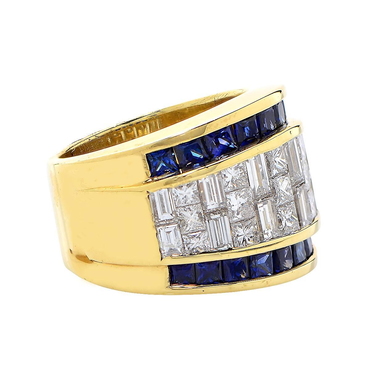18 Karat Yellow Gold Band Set with 32 Princess and Baguette Cut Diamonds Weighing Approximately 3.25 Carats and 20 Blue Sapphires Having an Approximately Total Weight of 3 Carats.