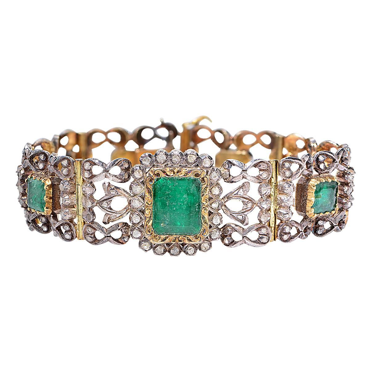 Victorian Bracelet Containing 7 Emerald Cut Emeralds Approximately 28 Carats and 169 Diamonds Approximately 1.50 Carats - Silver Over 18 Karat Yellow Gold - French Hallmarks. Length is 7.75