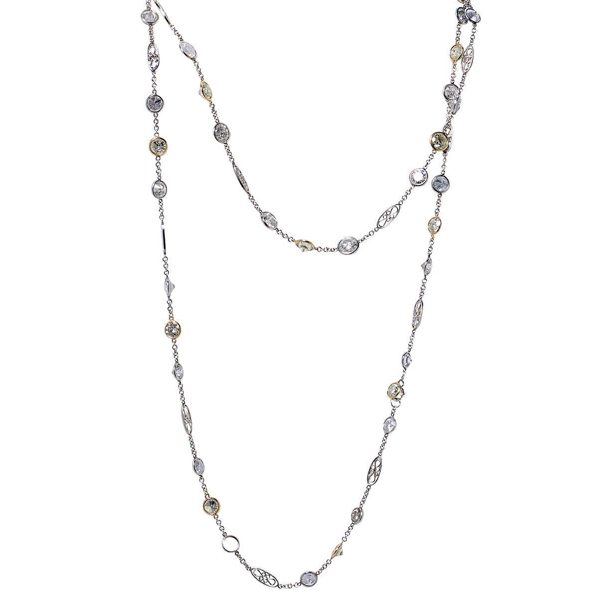 Splendida collana Diamonds by the Yard realizzata in platino, con 54 diamanti bianchi e gialli taglio brillante per un peso totale di circa 35,35 carati, purezza SI-I. Questa collana ispirata a Jazz Diva misura 42 pollici di lunghezza e pesa 22,54