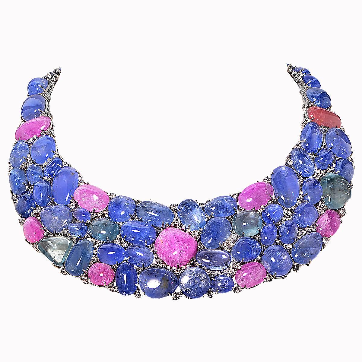 18 Karat White Gold Necklace Set with Approximately 768 Carat of Blue Sapphire and 6.25 Carats of Round Brilliant Cut Diamonds, G Color, VS Clarity.

Measurement: 15 inch in Length

This Gorgeous Necklace is Accompanied by a Retail Appraisal