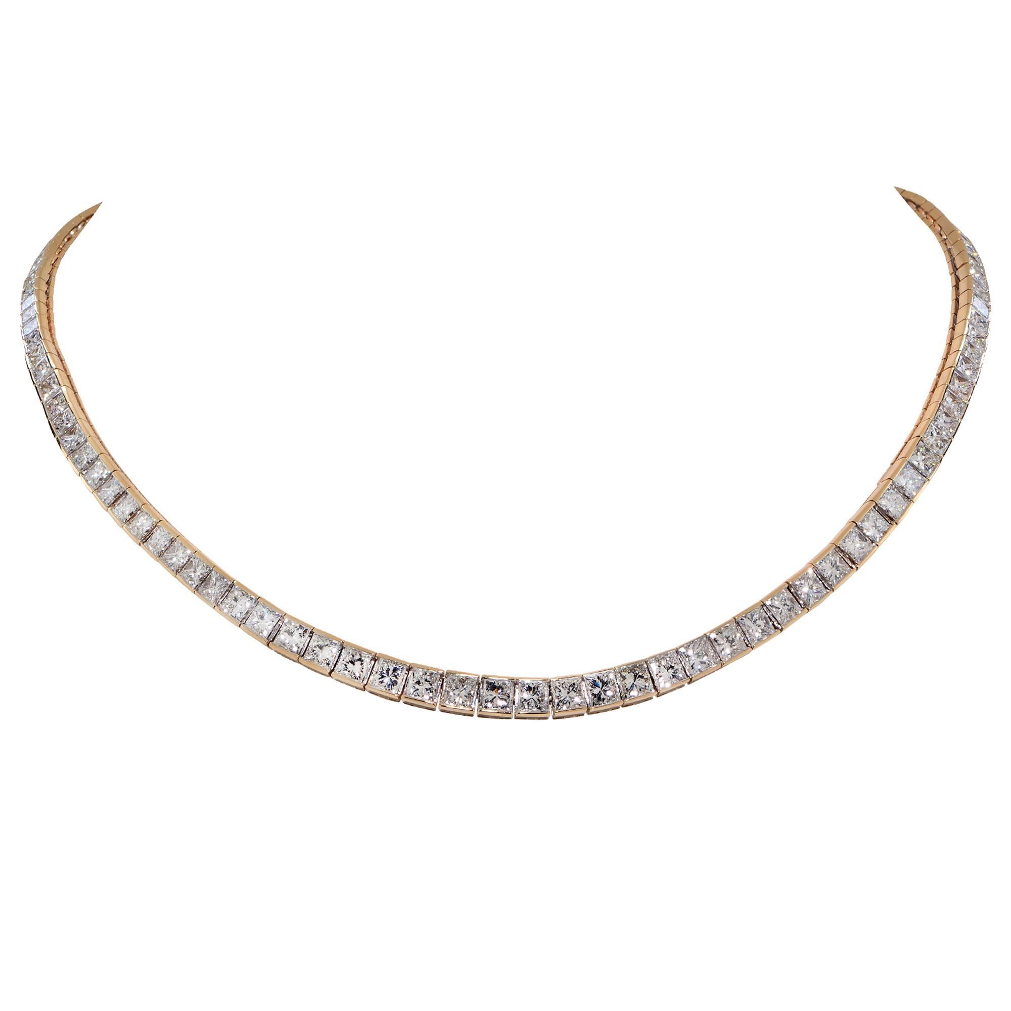 14 Karat Yellow Gold Graduating Necklace Featuring 125 Princess Cut Diamonds Weighing Approximately 22 Carats Total, G-H Color, VS-SI Clarity.

Measurement: 16.5 inch Length x 1/8 - 1/4 inch Width
Weight: 38.87

This Beautiful Necklace is