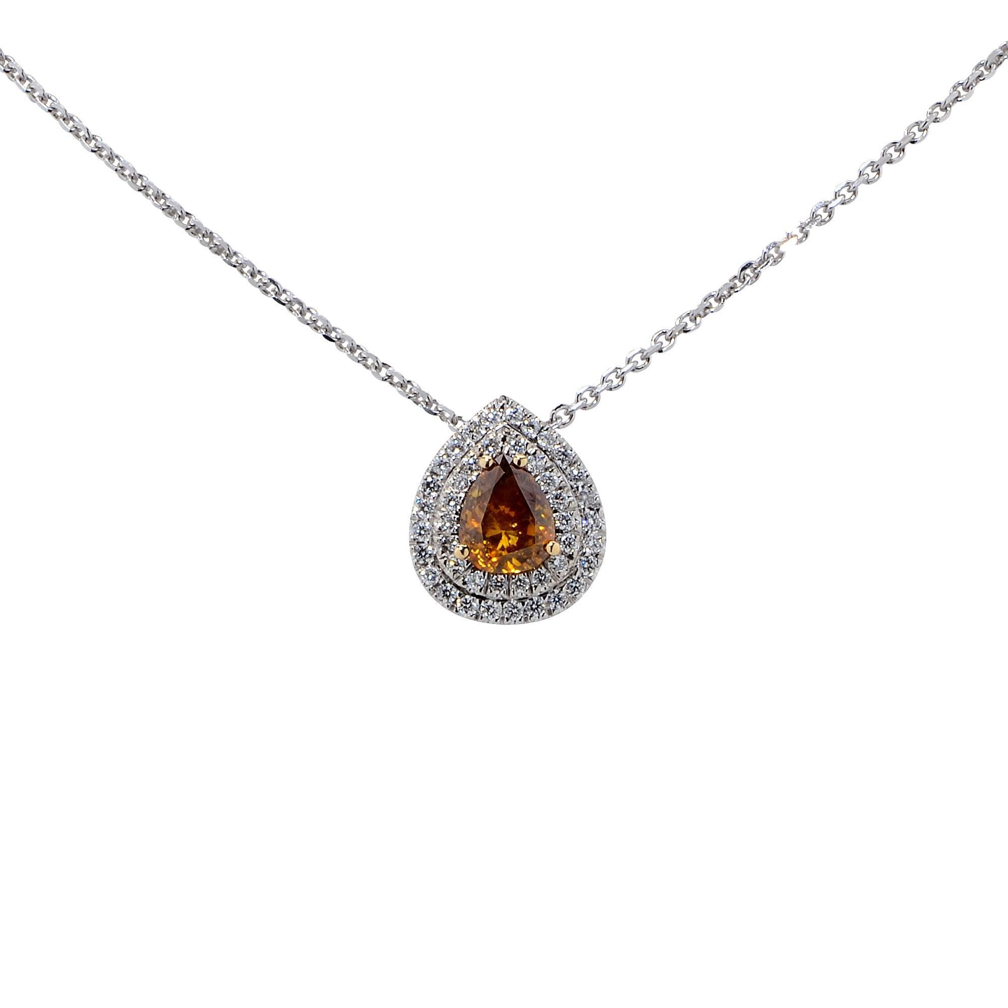 18 Karat White Gold Necklace Featuring a 1.10 Carat Fancy Deep Brownish Orangey Yellow Pear Shape Diamond Accented by .33 Carats of Round Brilliant Cut Diamonds, G Color, VS Clarity.

Weight: 3.91 grams

This Necklace is Accompanied by a GIA