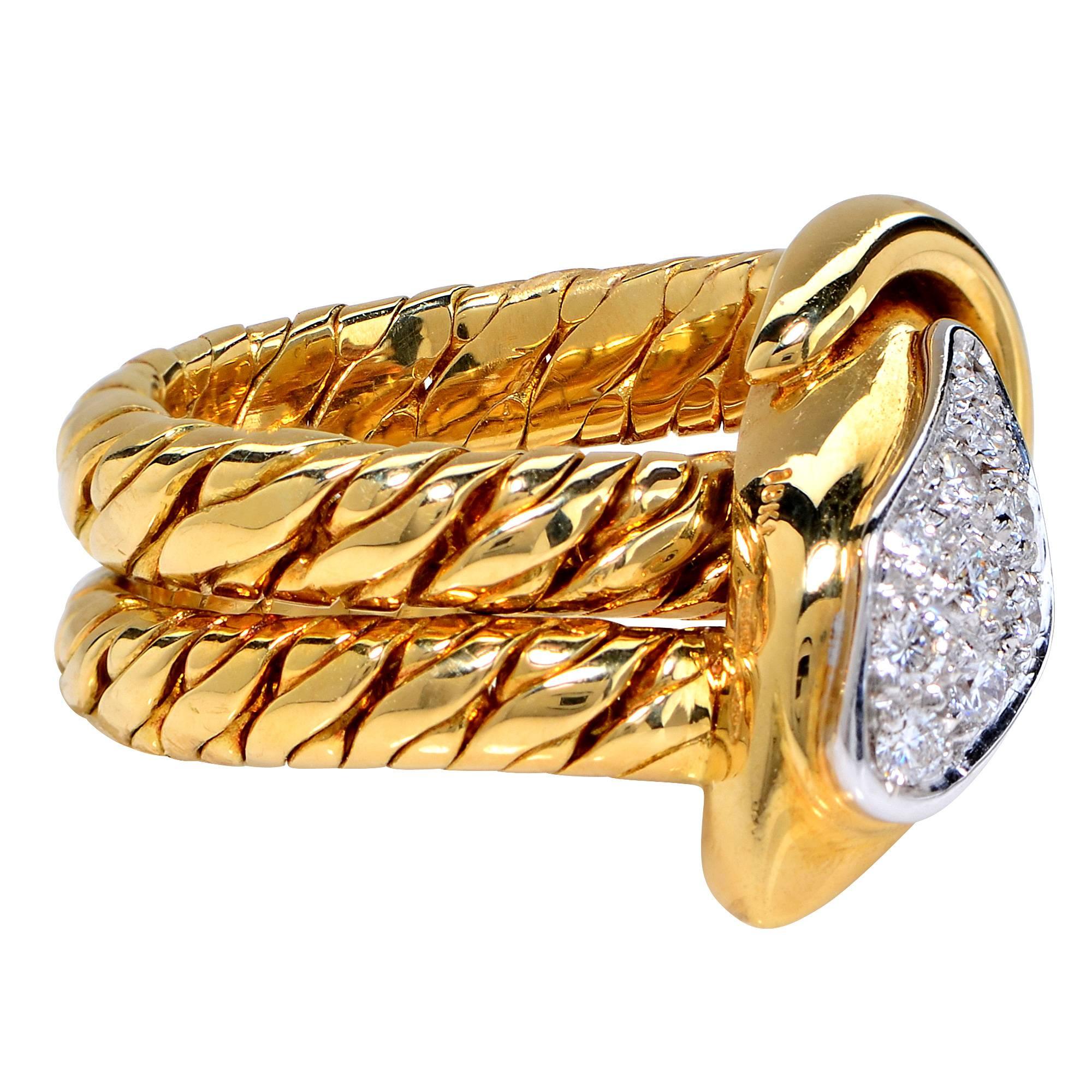 18 Karat Yellow Gold Pomellato Diamond Snake Ring Featuring 10 Round Brilliant Cut Diamonds with an Estimated Total Weight of .35 Carats.

Ring size: 5.5
Weight: 20.37 grams

This Ring is Accompanied by a Retail Appraisal Performed by an