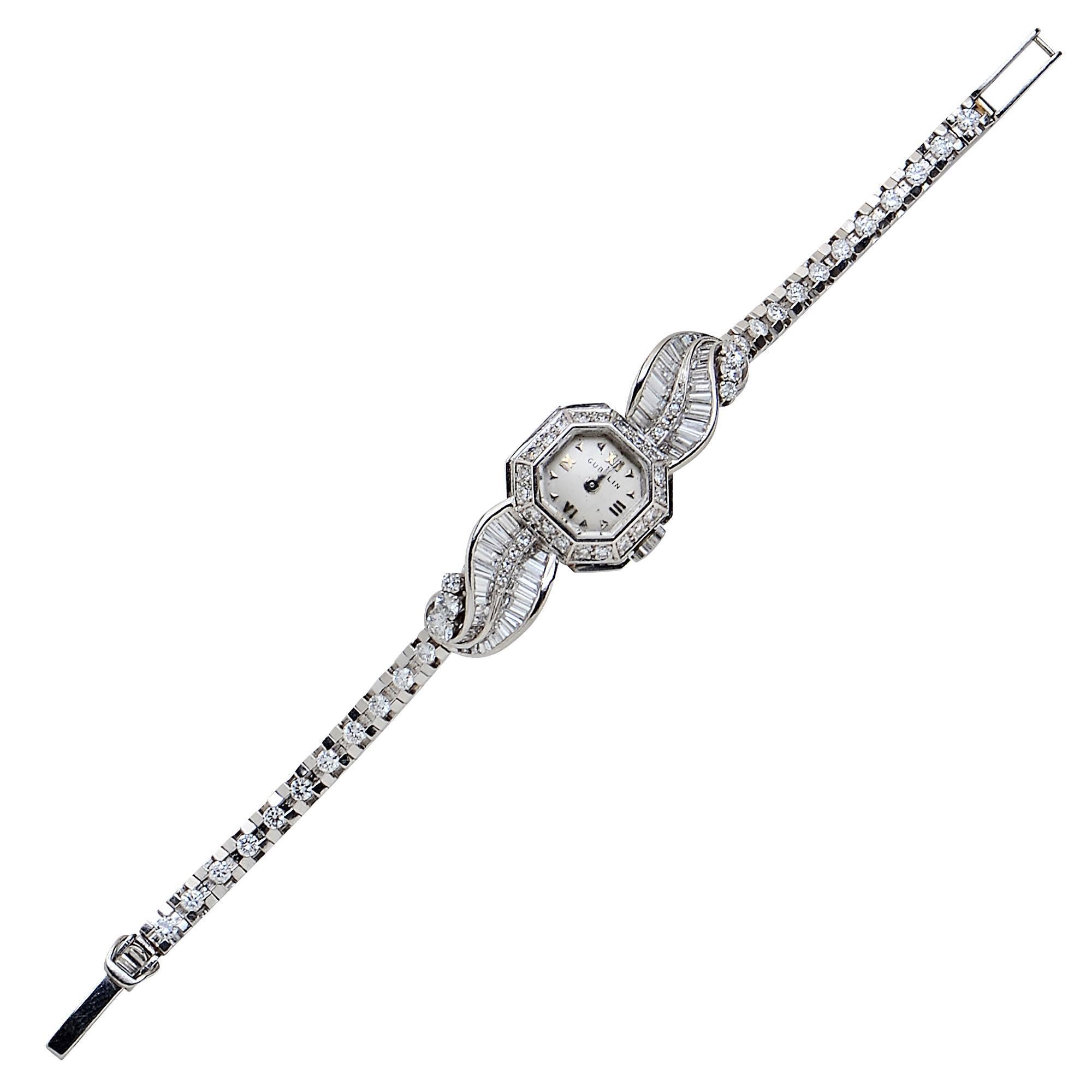 Platinum Gubelin Diamond Ladies Watch Featuring 98 Mix Cut Diamonds Weighing Approximately 3.2 Carats.

Weight: 25.65 grams

This Watch is Accompanied by a Retail Appraisal Performed by an Accredited Gemologist.