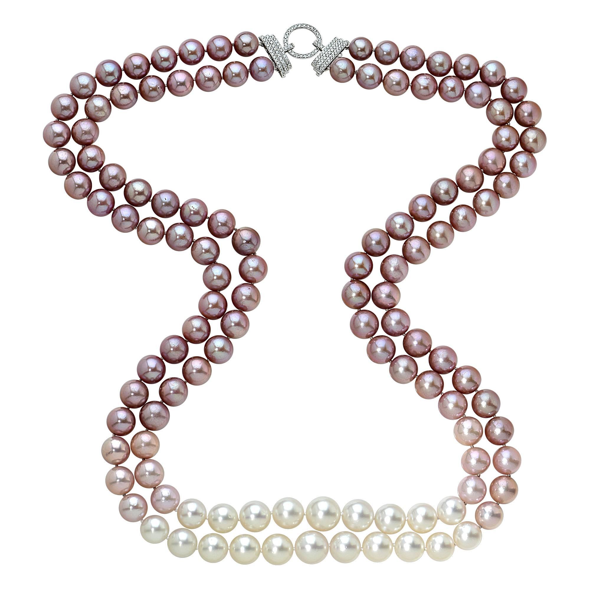 South sea and fresh water pearls accented by a diamond clasp.

This diamond necklace is accompanied by a retail appraisal performed by a Graduate Gemologist.