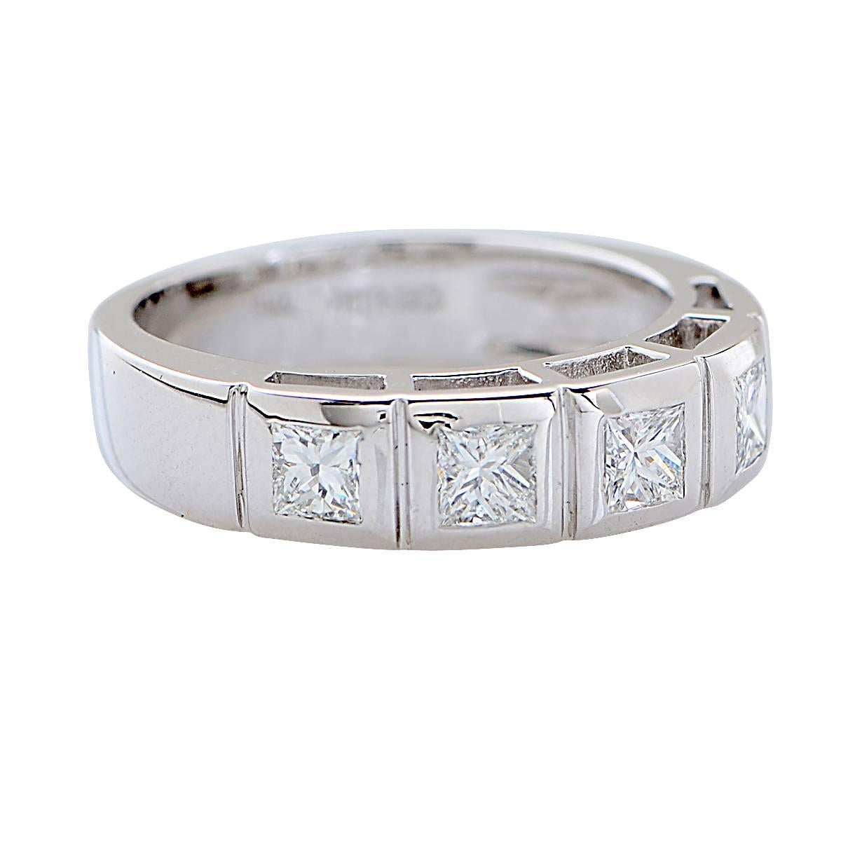 18 Karat White Gold Band Featuring 5 Princess Cut Diamonds Weighing Approximately 1.00 Carats Total, G Color, VS Clarity.

Metal weight: 4.99 grams

This Diamond Ring is Accompanied by a Retail Appraisal Performed by a Graduate Gemologist.