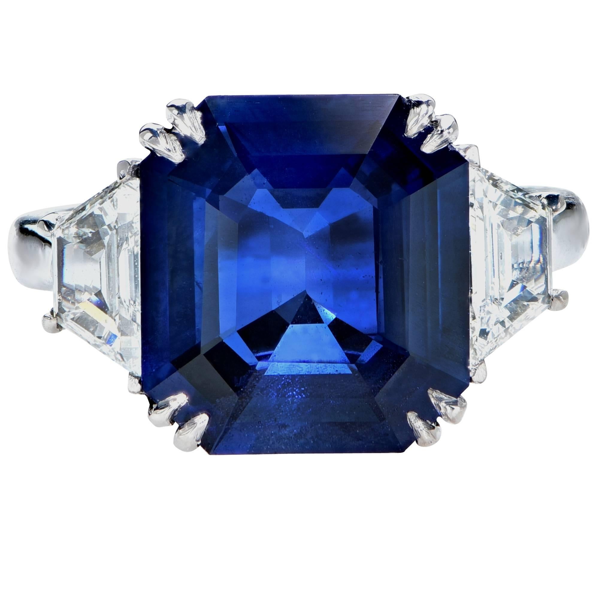This beautiful custom-made platinum ring features an 8.24ct unheated Madagascar sapphire accented by 2 step-cut trapezoid cut diamonds weighing approximately 1.60cts total, G color, VS clarity.

Ring size: 6.5
Metal weight: 9.48 grams

This