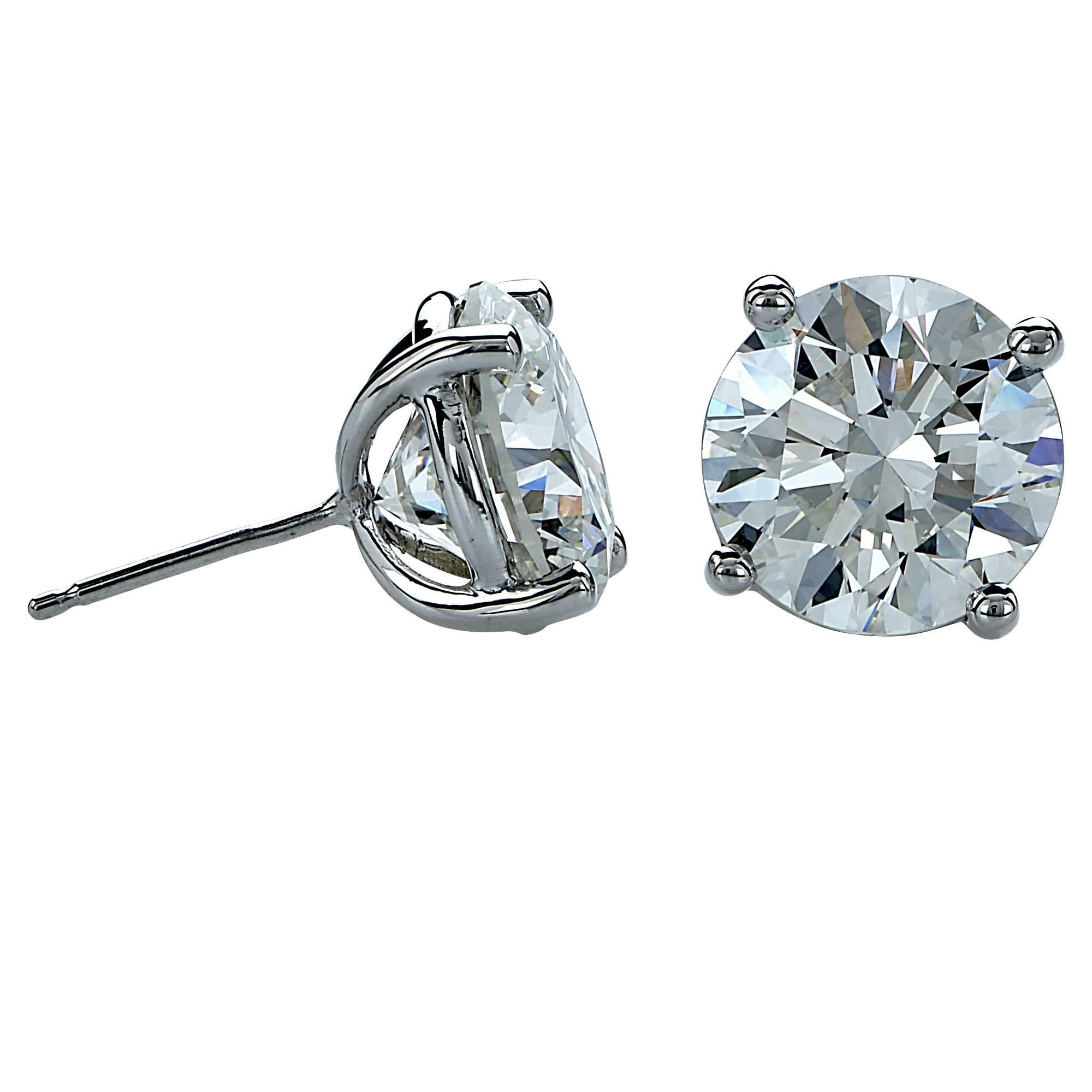 Exquisite, stunning and very rare. These meticulously and perfectly matched pair of round brilliant cut diamonds features a 4.01ct I/VS2 and a 3.99ct I/VS2 both GIA graded. They are set into 18k white gold hand-made solitaire studs. We can forward