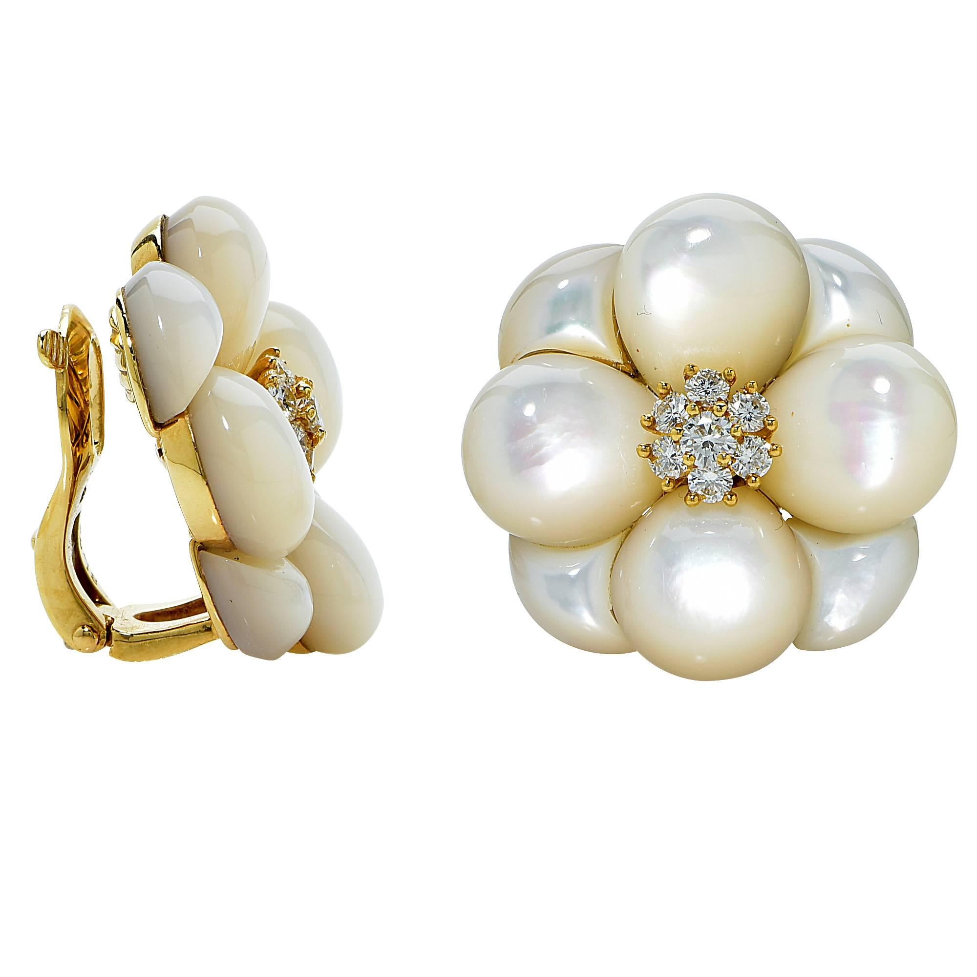 18k yellow gold Van Cleef and Arpel earrings featuring cabochon mother of pearl and .80cts of round brilliant cut diamonds, F color, VS clarity.

Metal weight: 25.65 grams

These mother of pearl and diamond earrings are accompanied by a retail