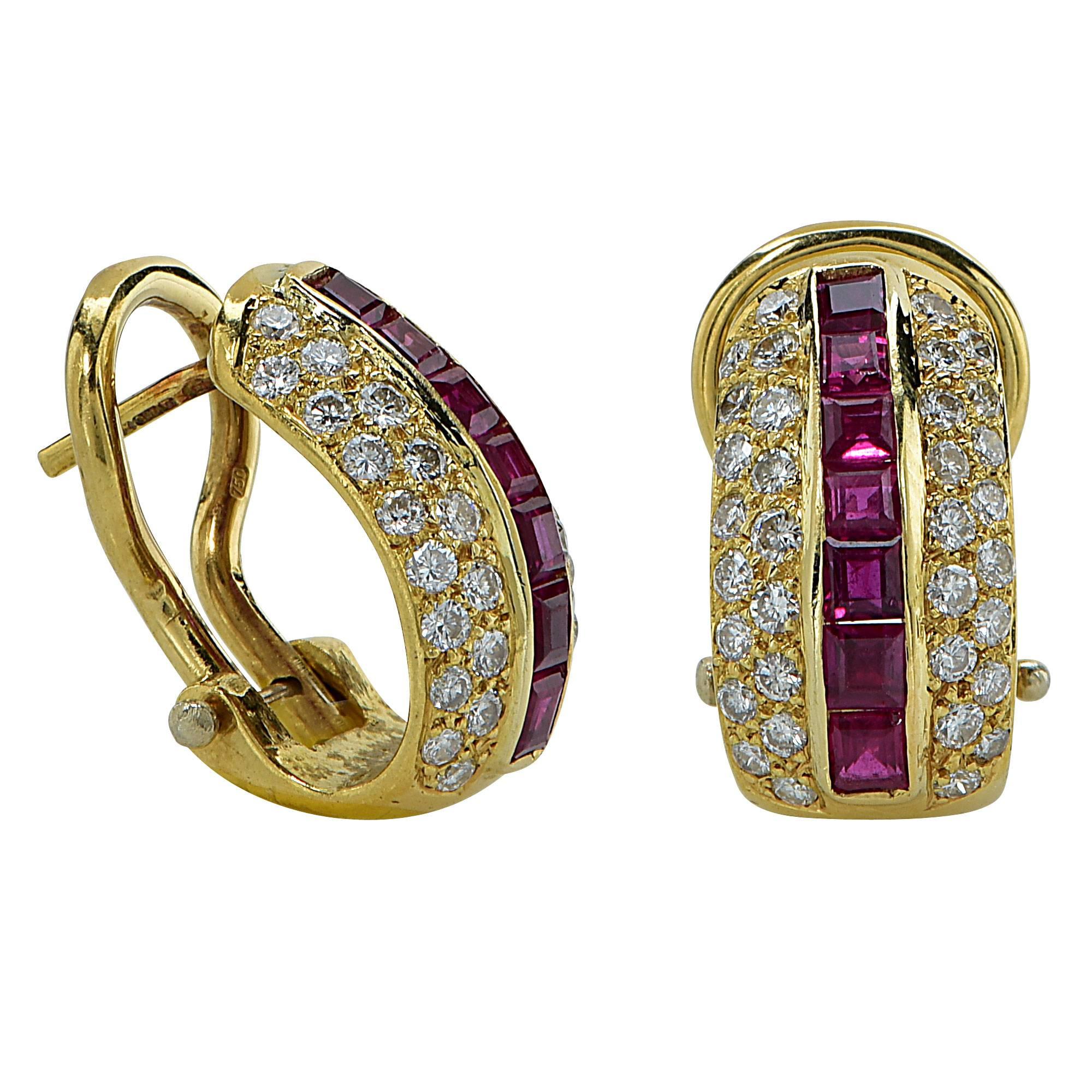 18k yellow gold earrings featuring 68 round brilliant cut diamonds weighing approximately .70cts, G color, VS clarity.

Metal weight: 8.39 grams

These diamond and ruby earrings are accompanied by a retail appraisal performed by a Graduate