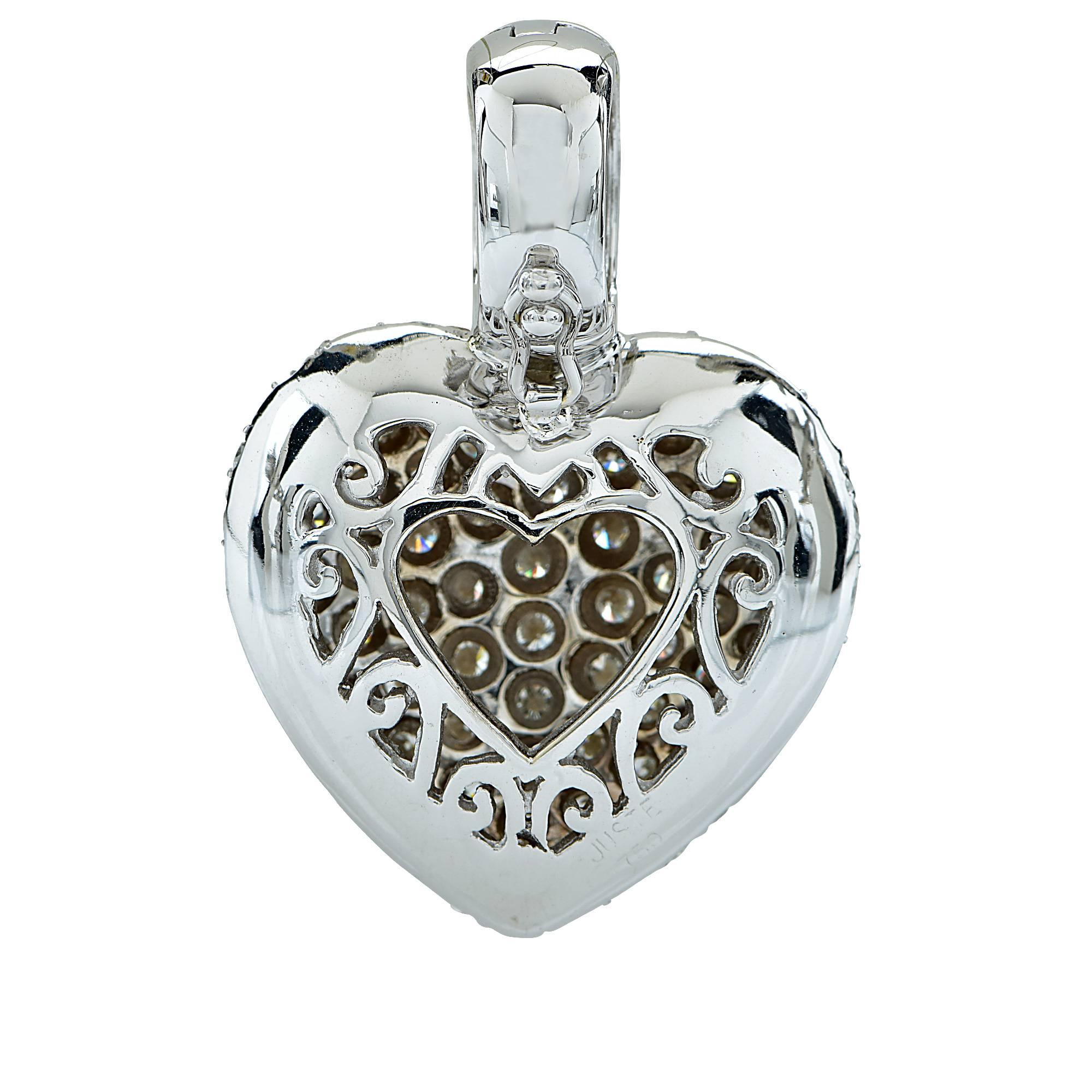 18k white gold heart pendant featuring approximately 5.50cts of round brilliant cut diamonds, G color, VS clarity.

Metal weight: 18.20 grams

This diamond pendant is accompanied by a retail appraisal performed by a Graduate Gemologist.