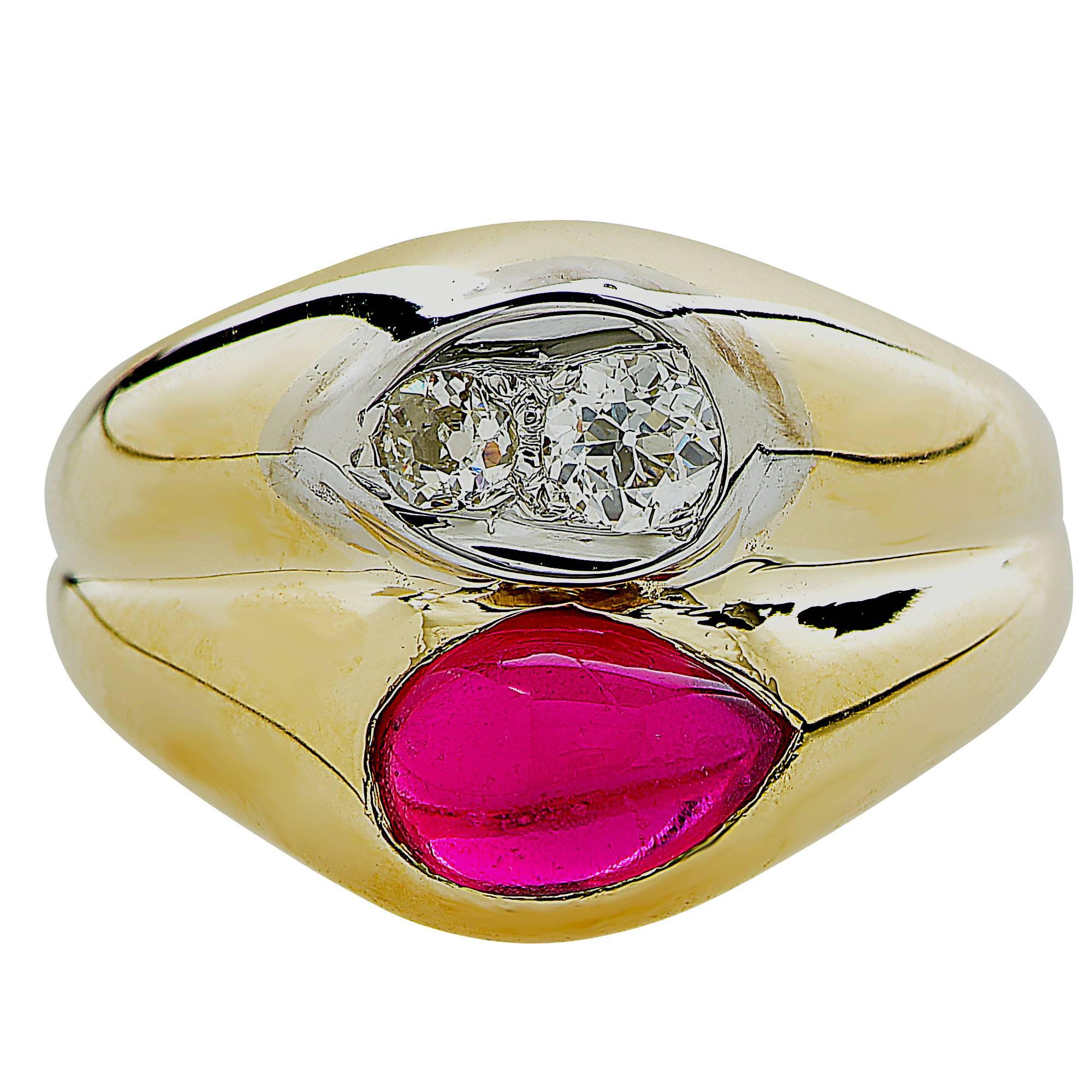14k yellow gold ring featuring a pear shape cabochon cut synthetic ruby weighing approximately 1.20cts and two old European cut diamonds weighing approximately .30cts.

Metal weight: 8.70 grams

This ruby and diamond ring is accompanied by a