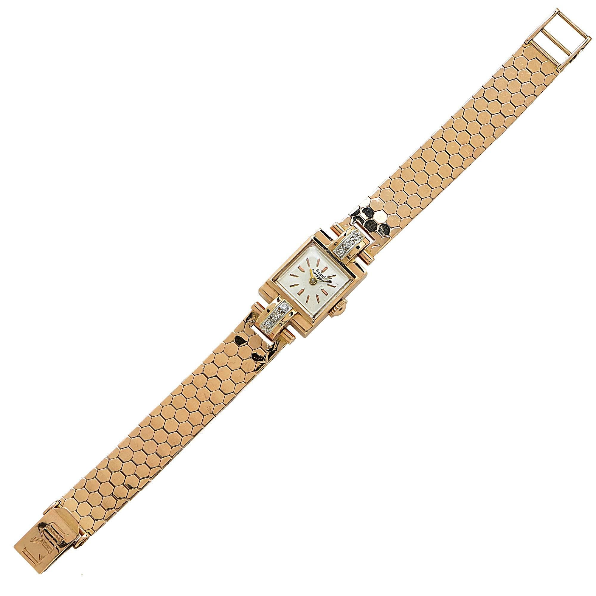 Lady's 18k rose gold Girard Perregaux watch with diamonds featuring 6 single cut diamonds with an estimated total weight of .10cts.

Metal weight: 36.69 grams

This gold and diamond watch is accompanied by a retail appraisal performed by a