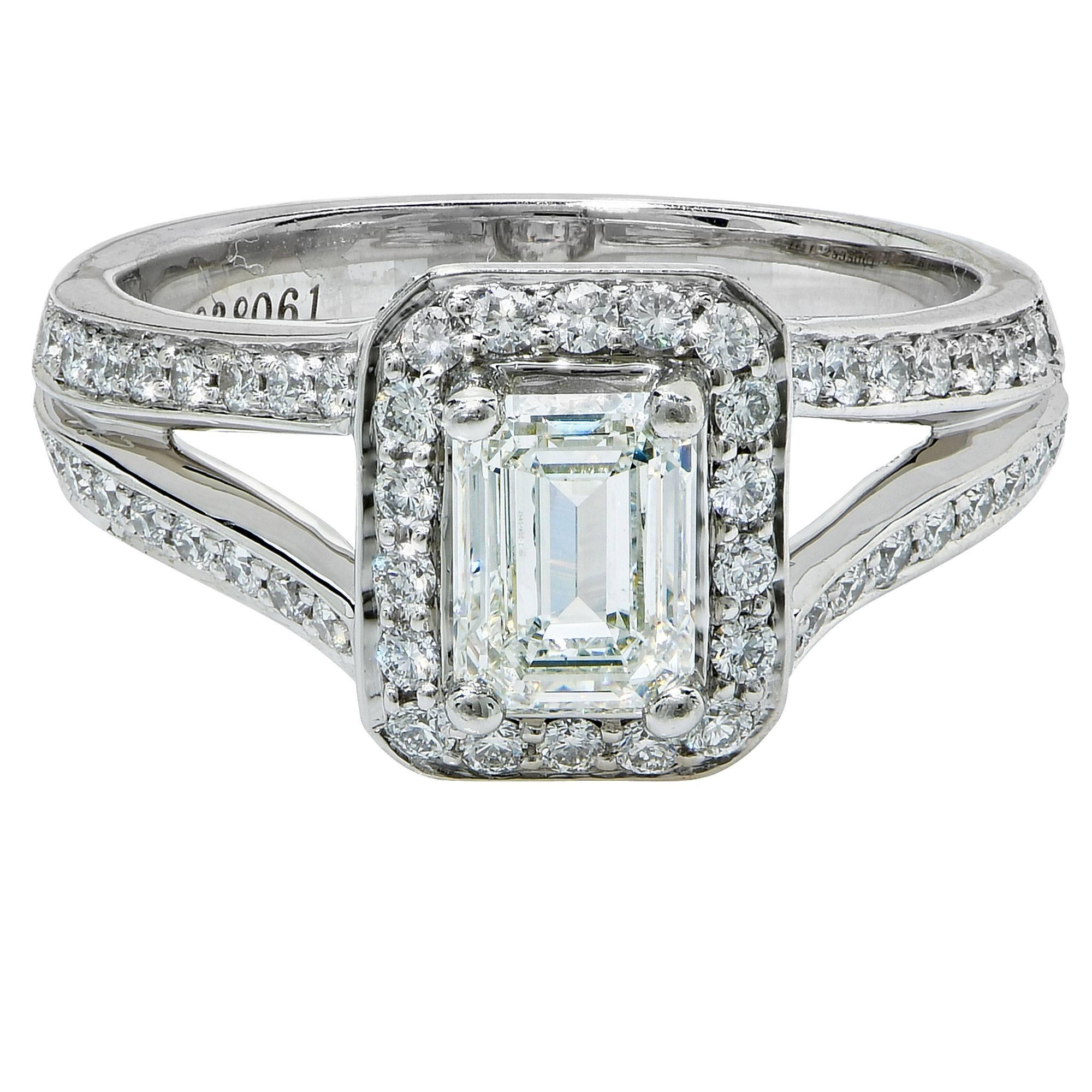 Platinum ring featuring a 1.07ct, I color, VS1 clarity, accented by 64 round brilliant cut diamonds weighing .64cts total, G color, VS clarity.

Ring size: 6 (can be sized up or down free of charge)
Metal weight: 9.79 grams

This diamond ring