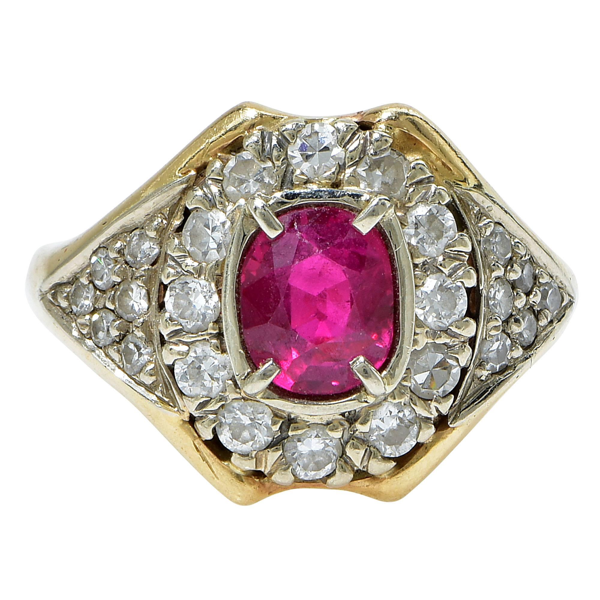 This sweet period ring features an oval cut Burma ruby surrounded by 24 single cut diamonds set in 18 karat yellow and white gold.

This ring is accompanied by an appraisal signed by a GIA Graduate Gemologist.