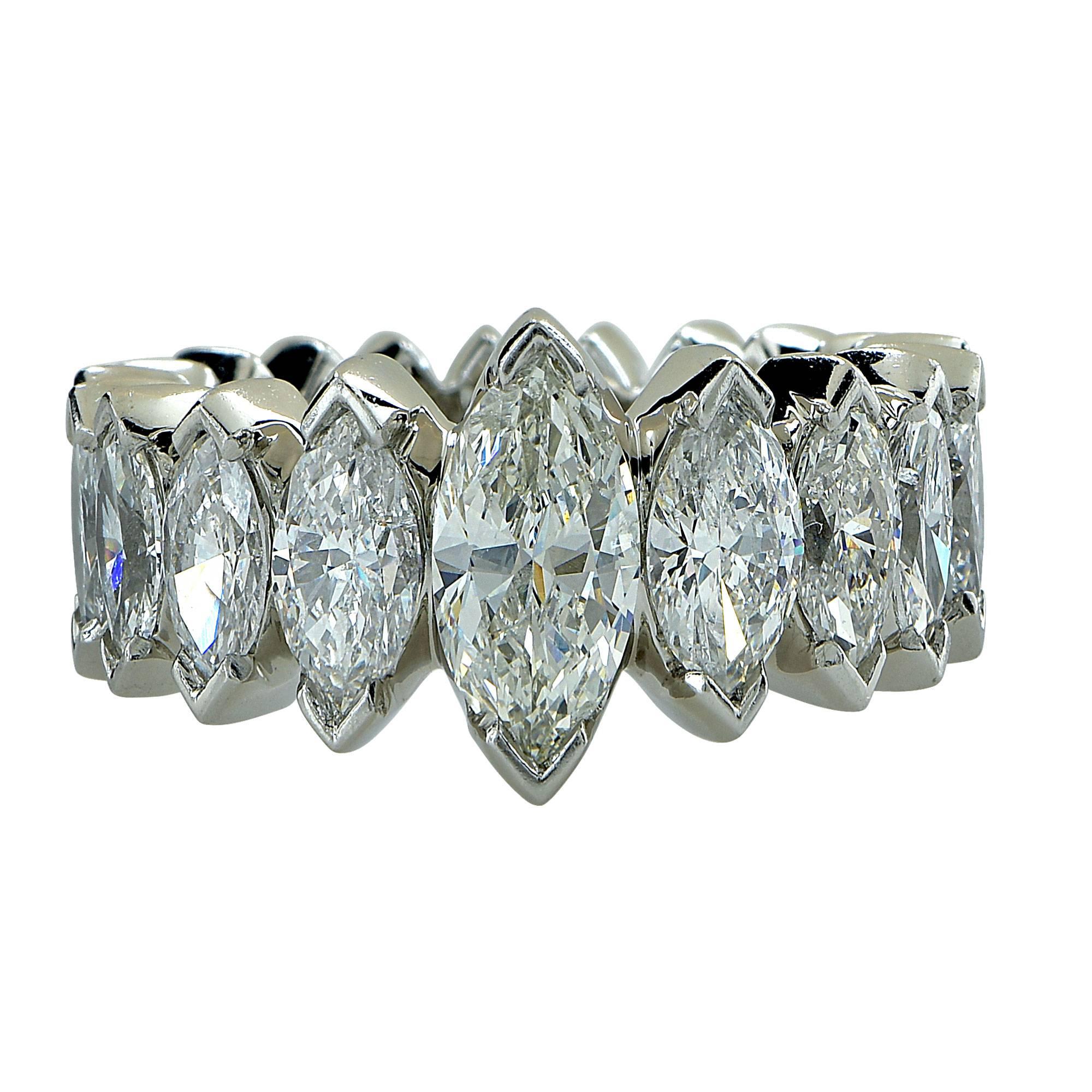 Platinum eternity band featuring 20 marquise cut diamonds weighing approximately 5.40cts total, G-H color, VS-SI clarity.

Ring size: 5 (can not be sized up or down)
Metal weight: 13.99 grams

This diamond eternity band is accompanied by a