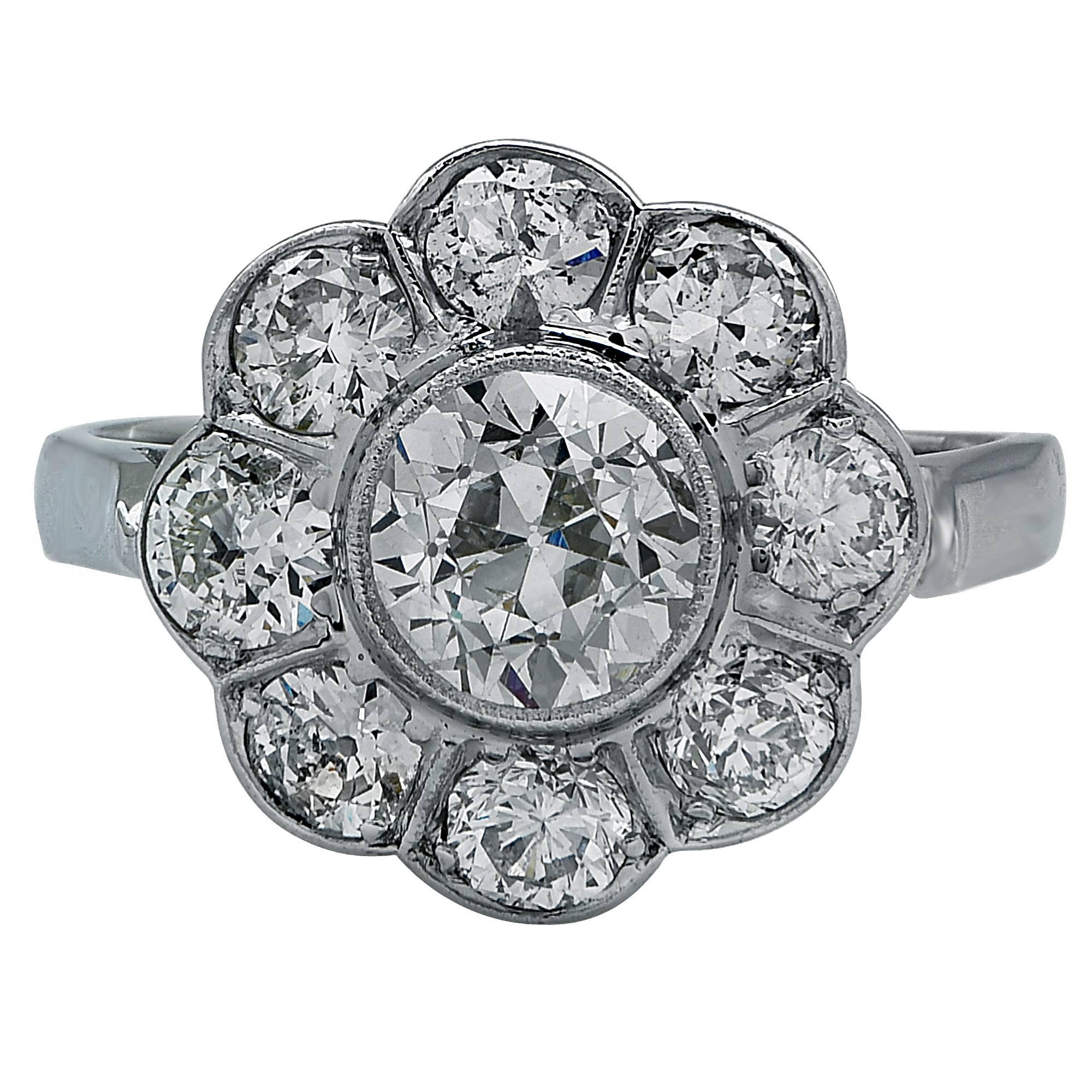 14k white gold diamond engagement ring featuring an old European cut diamond weighing 1.32cts accented by 8 mix cut diamonds weighing approximately 1.60cts total.

Metal weight: 4.38 grams

This diamond ring is accompanied by a retail appraisal