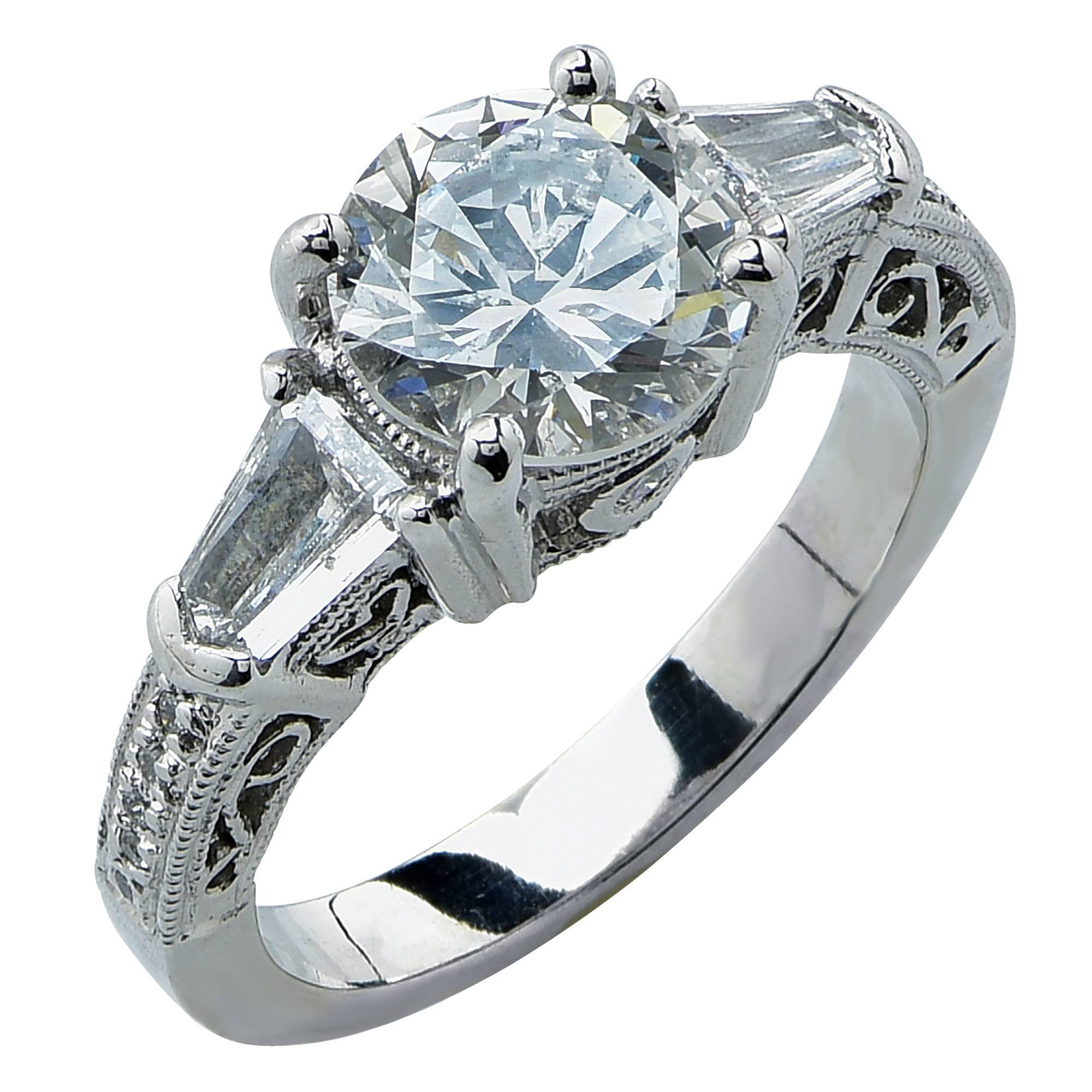 Platinum ring featuring a GIA graded 1.82ct round brilliant cut diamond H color SI1 clarity accented by 2 bullet cut diamonds weighing .50cts total G color VS-SI clarity, accented by 14 round brilliant cut diamonds weighing .15cts total, G color VS