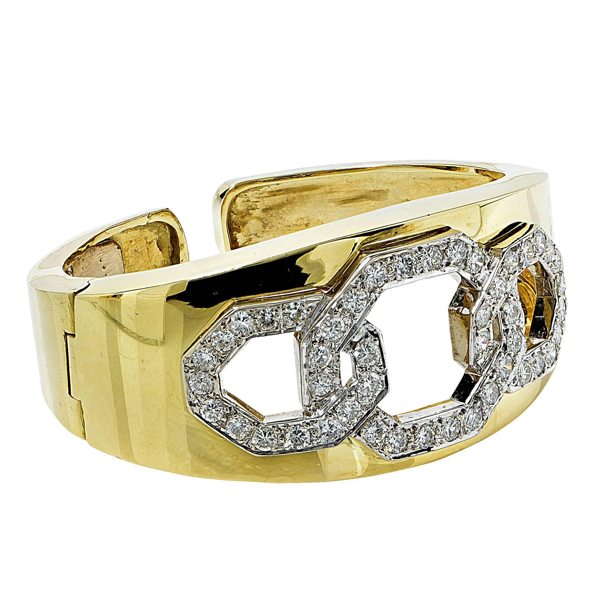 18k Yellow Gold Bangle containing 46 round brilliant cut diamonds weighing approximately 5cts F-G color and VS clarity.

Metal weight: 80.16 grams

This diamond bracelet is accompanied by a retail appraisal performed by a GIA Graduate Gemologist.
