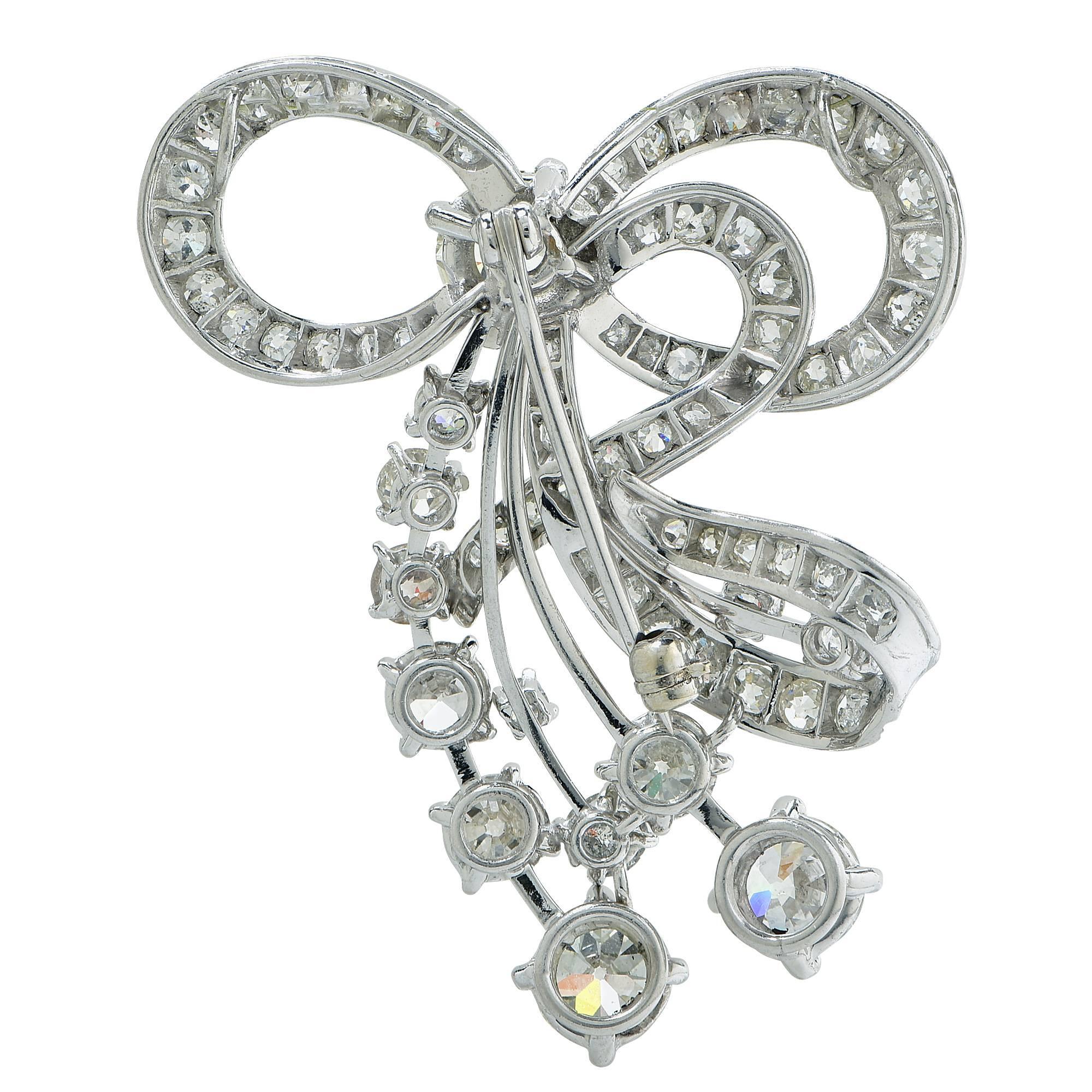 Platinum brooch featuring 71 old European cut diamonds weighing 4.70cts total G-K color VS-SI clarity.

Metal weight: 14.61 grams

This diamond brooch is accompanied by a retail appraisal performed by a GIA Graduate Gemologist.