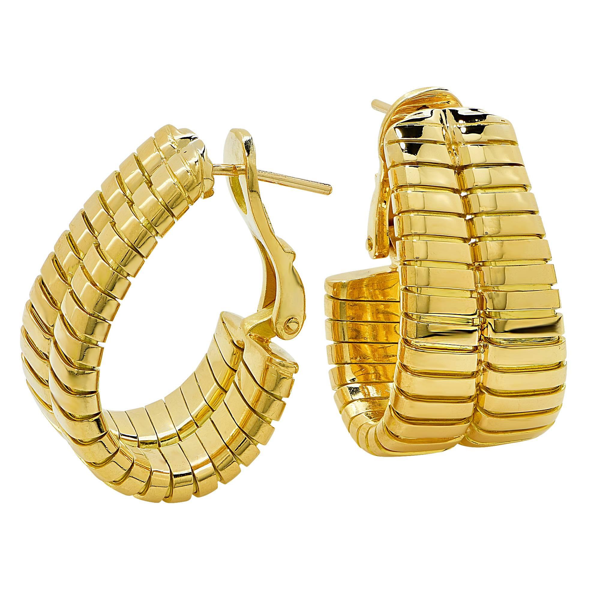 18k yellow gold Buglari hoop earrings.

Metal weight: 36.21 grams

These Bulgari earrings are accompanied by a retail appraisal performed by a GIA Graduate Gemologist.