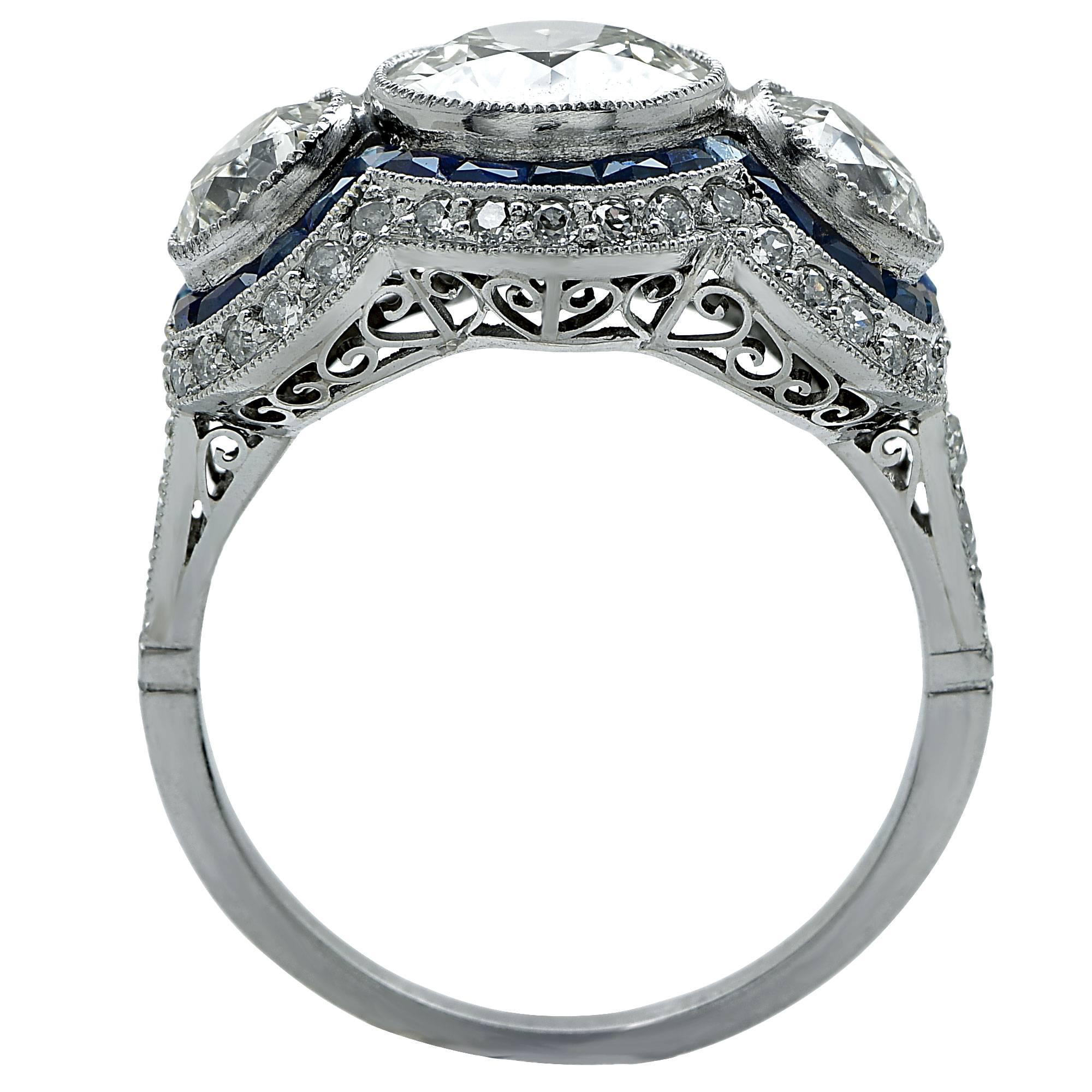 3.74 Karat Diamant Saphir Platin Drei Stein Ring 1