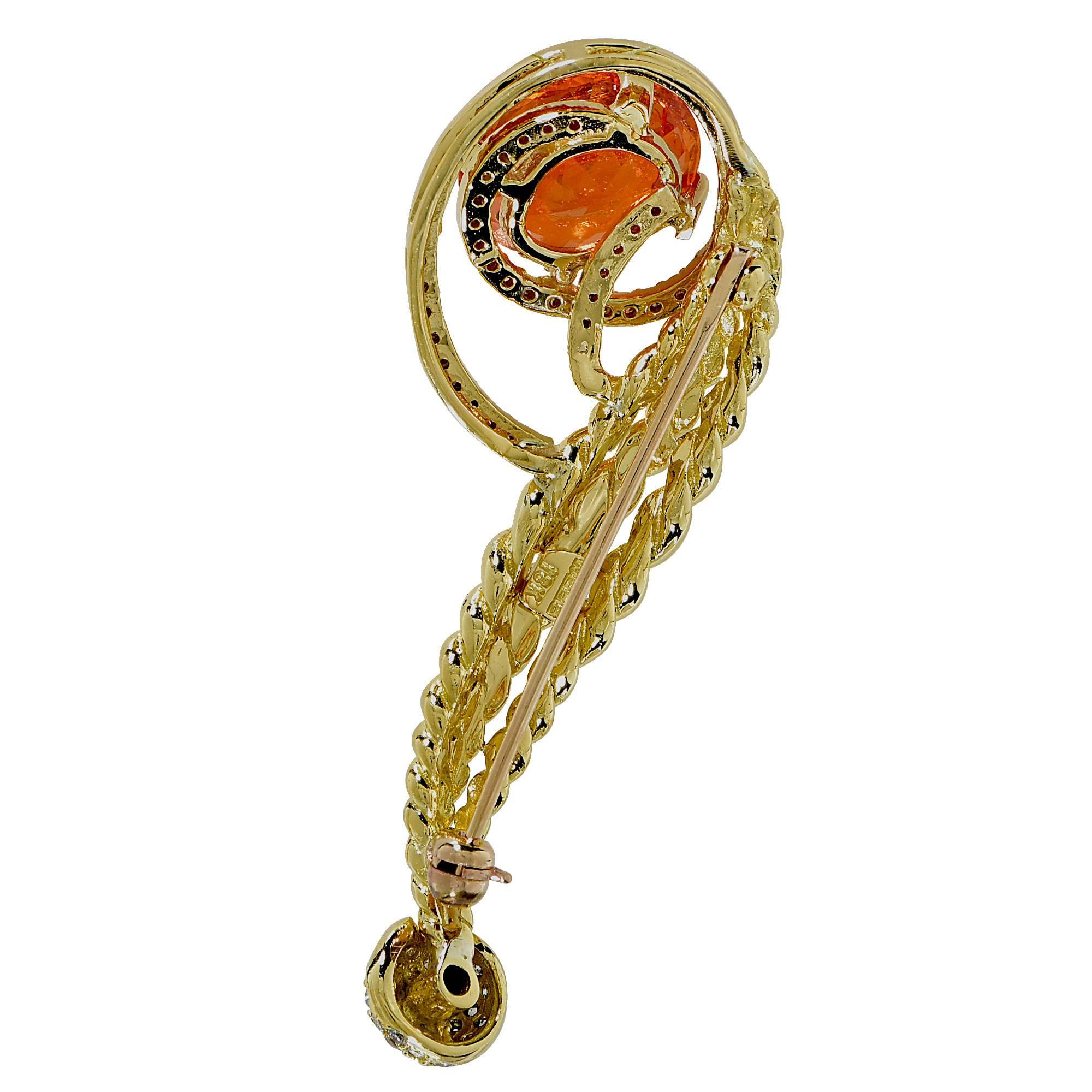 18K yellow gold David Webb brooch containing a 5ct Spessartite Garnet accented by 99 mixed cut diamonds weighing approximately .50cts.

This gold brooch is accompanied by a retail appraisal performed by a GIA Graduate Gemologist.