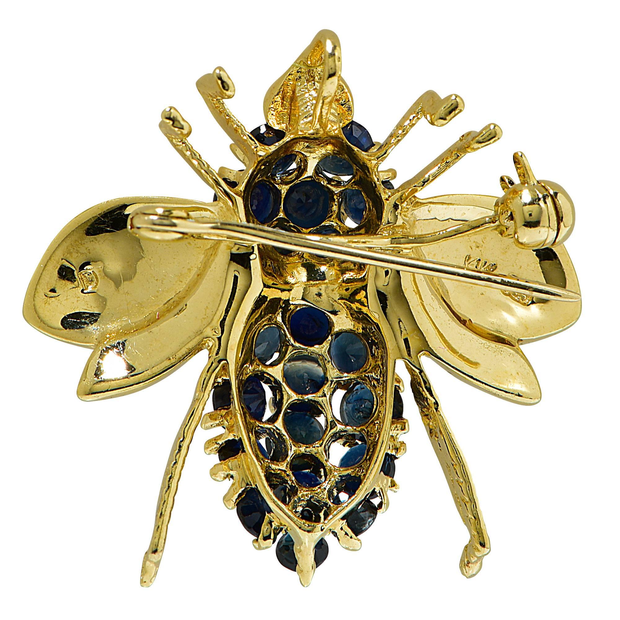 14k yellow gold fly brooch featuring approximately 2cts of round cut blue sapphires.

Metal weight: 5.36 grams

This sapphire brooch is accompanied by a retail appraisal performed by a GIA Graduate Gemologist.