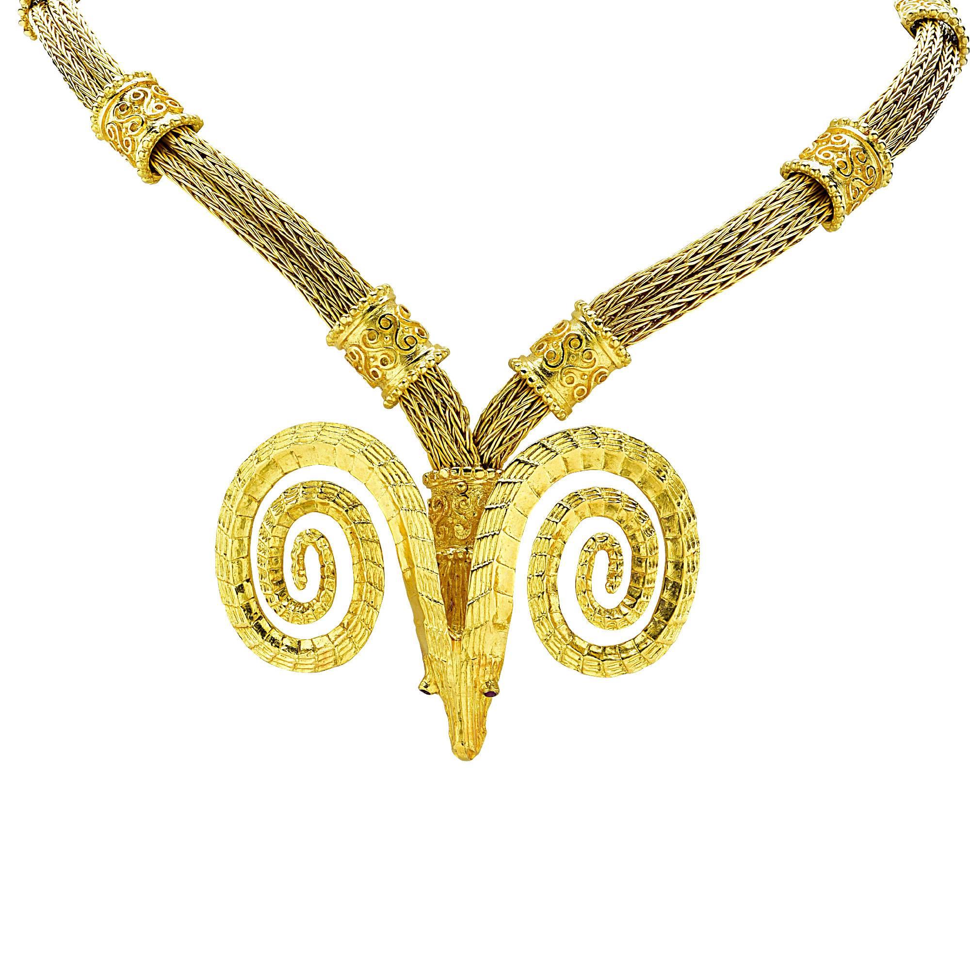 18K yellow gold necklace, bracelet and earring set. Woven gold chain accented by a ram's head motif. Made in Greece.

Metal weight: 184.96 grams

This gold set is accompanied by a retail appraisal performed by a GIA Graduate Gemologist.