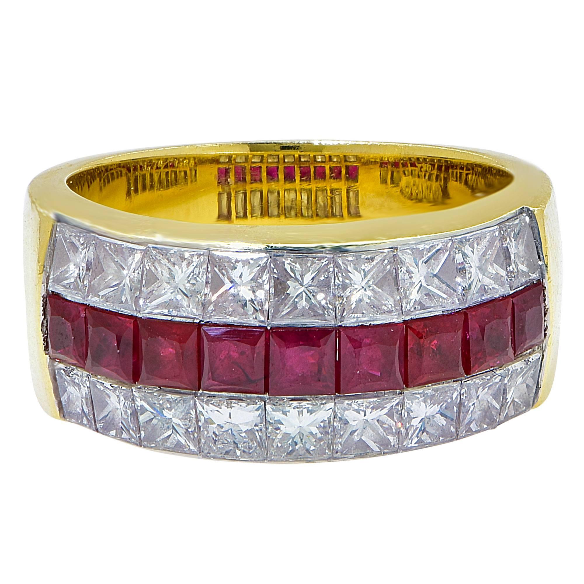 18k yellow gold ring featuring 9 square cut Burma rubies weighing 1.28cts total, accented by 18 princess cut diamonds weighing 1.76cts total, F color VS clarity.

Ring size: 6.25 (can be sized up or down)
Metal weight: 11.19 grams

This ruby