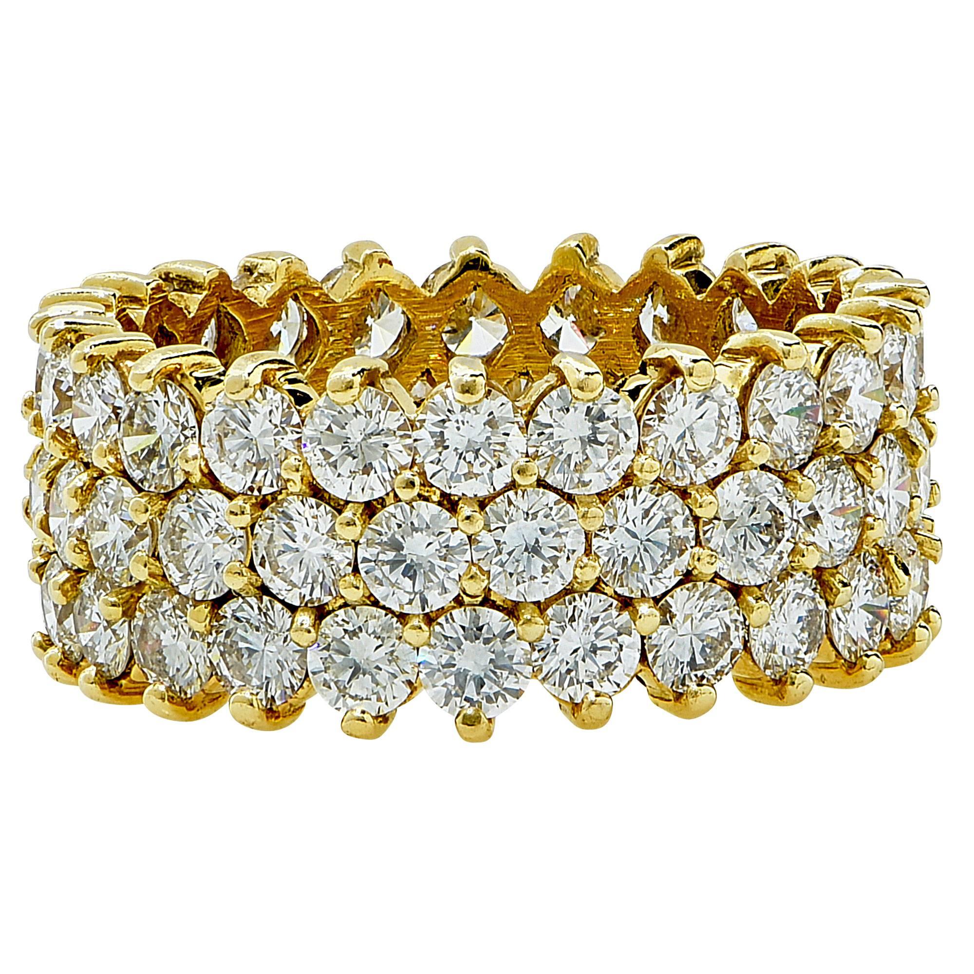18k yellow gold band featuring 75 round brilliant cut diamonds weighing approximately 3.75cts total, F color VS clarity. 

Metal weight: 5.67 grams

This diamond wedding band is accompanied by a retail appraisal performed by a GIA Graduate