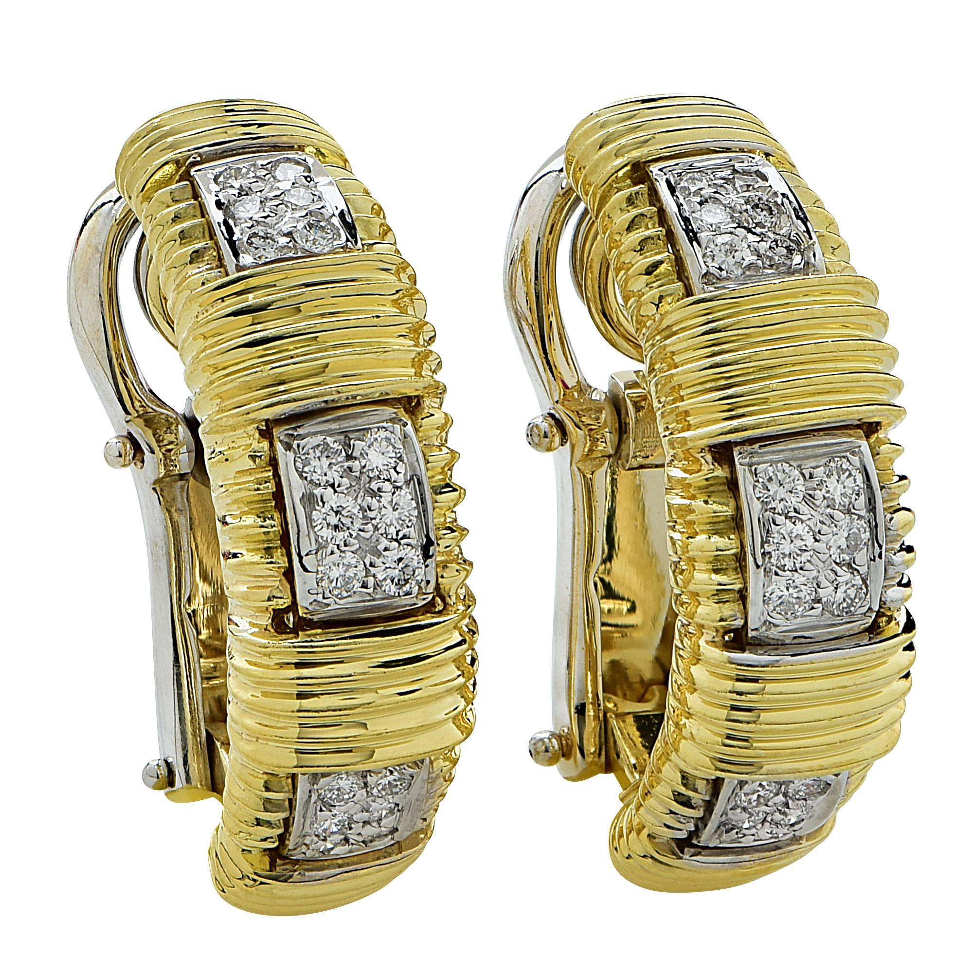 18k white and yellow gold Roberto Coin earrings featuring 36 round brilliant cut diamonds weighing approximately .40cts total, G color VS clarity.

Metal weight: 12.90 grams

These Roberto Coin diamond earrings are accompanied by a retail