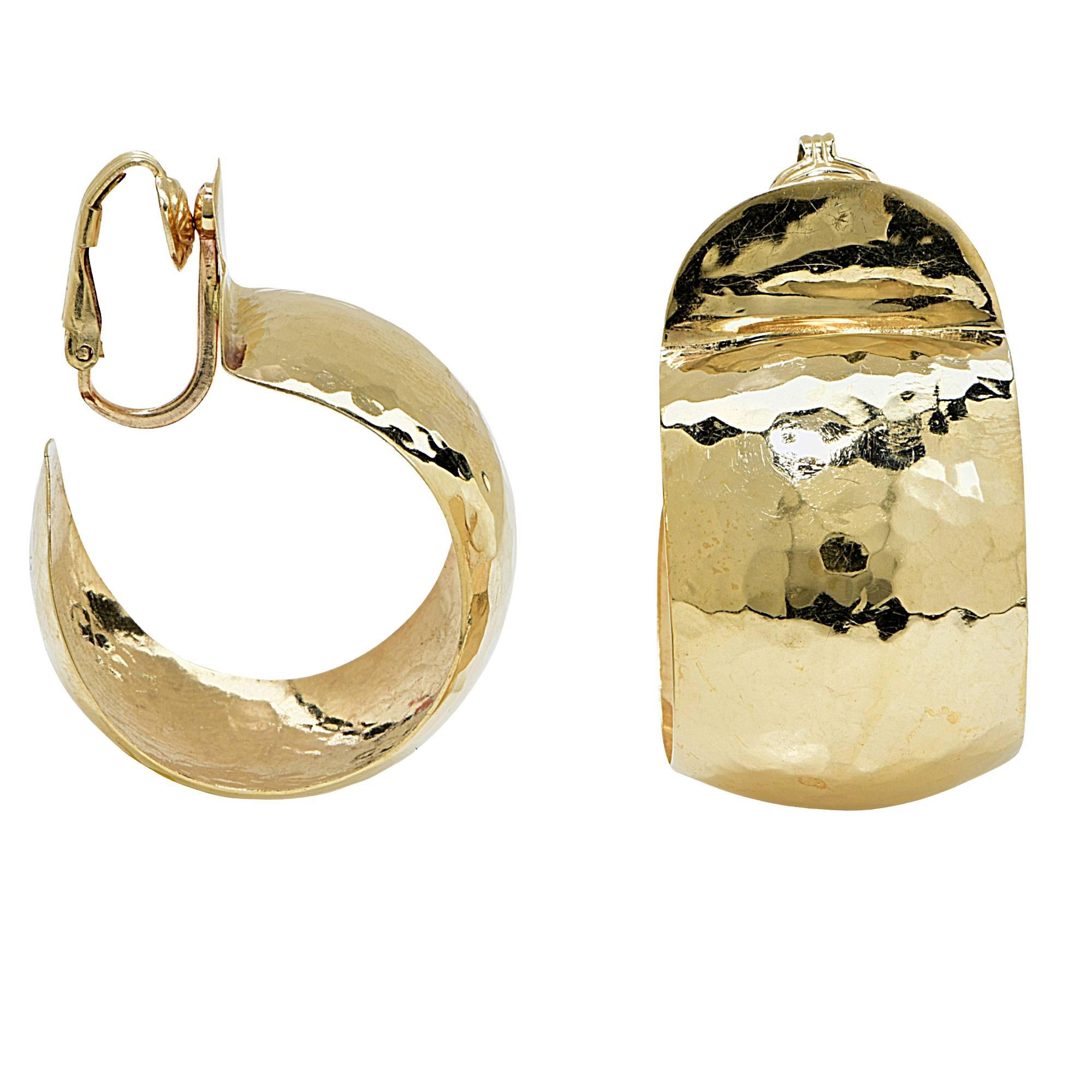 14k yellow gold hoop earrings.

Metal weight: 11.19 grams

These yellow gold earrings are accompanied by a retail appraisal performed by a GIA Graduate Gemologist.