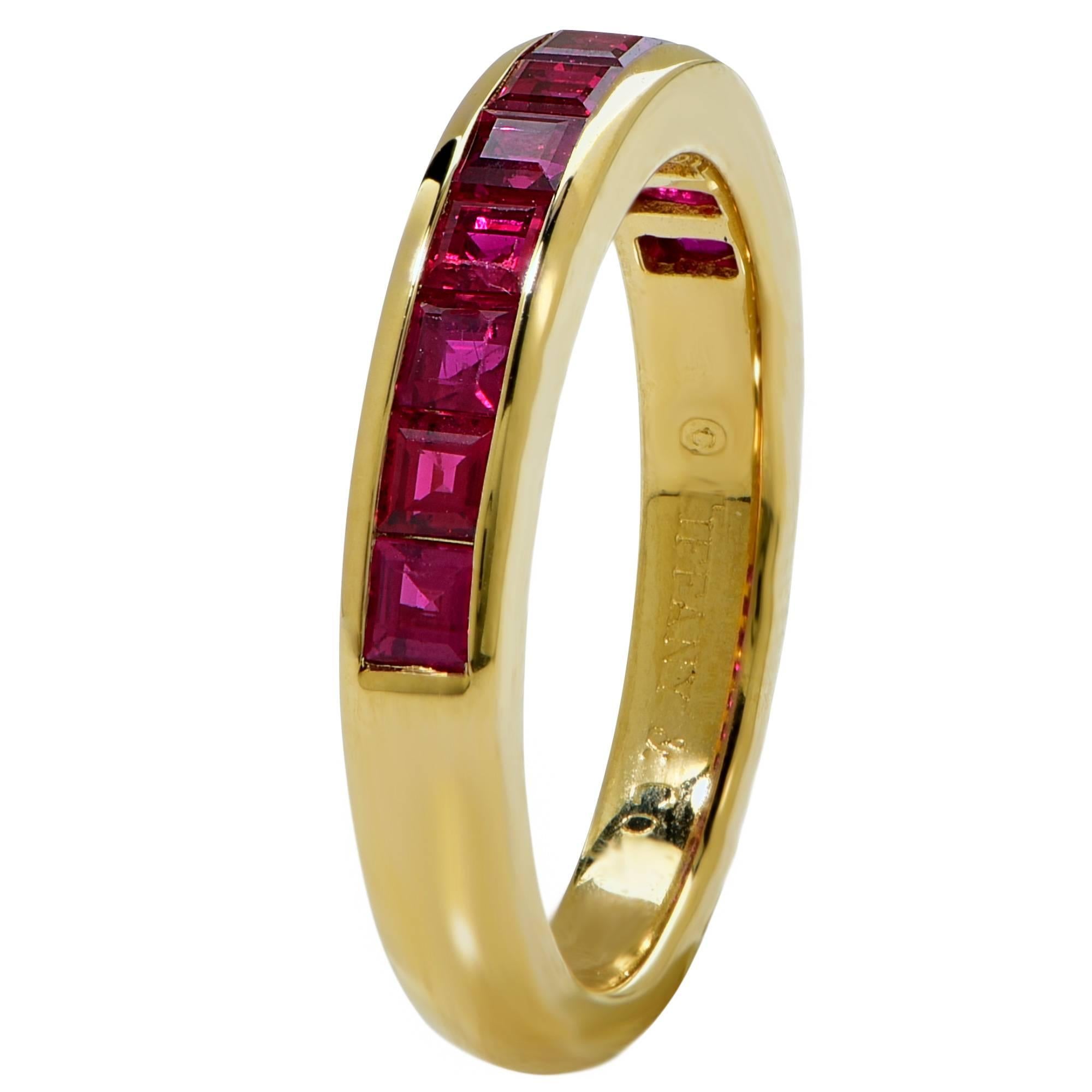 18k yellow gold Tiffany & Co. band featuring 11 rubies weighing approximately 1ct total.

The ring is a size 5 and cannot be sized.
It is stamped and tested as 18k gold.
The metal weight is 3.74 grams.

This ruby band is accompanied by a