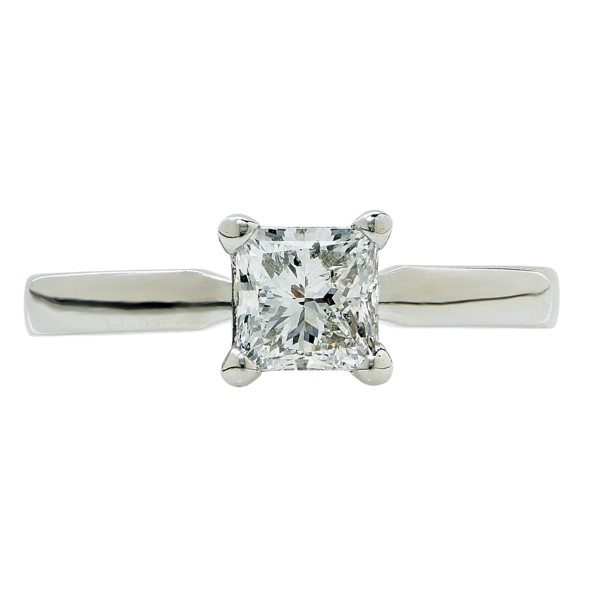 Platinum solitaire ring featuring a 1ct GIA graded princess cut diamond F color SI2 clarity.

The ring is a size 6.75 and can be sized up or down.
It is stamped and tested as platinum.
The metal weight is 5.28 grams.

This diamond ring is