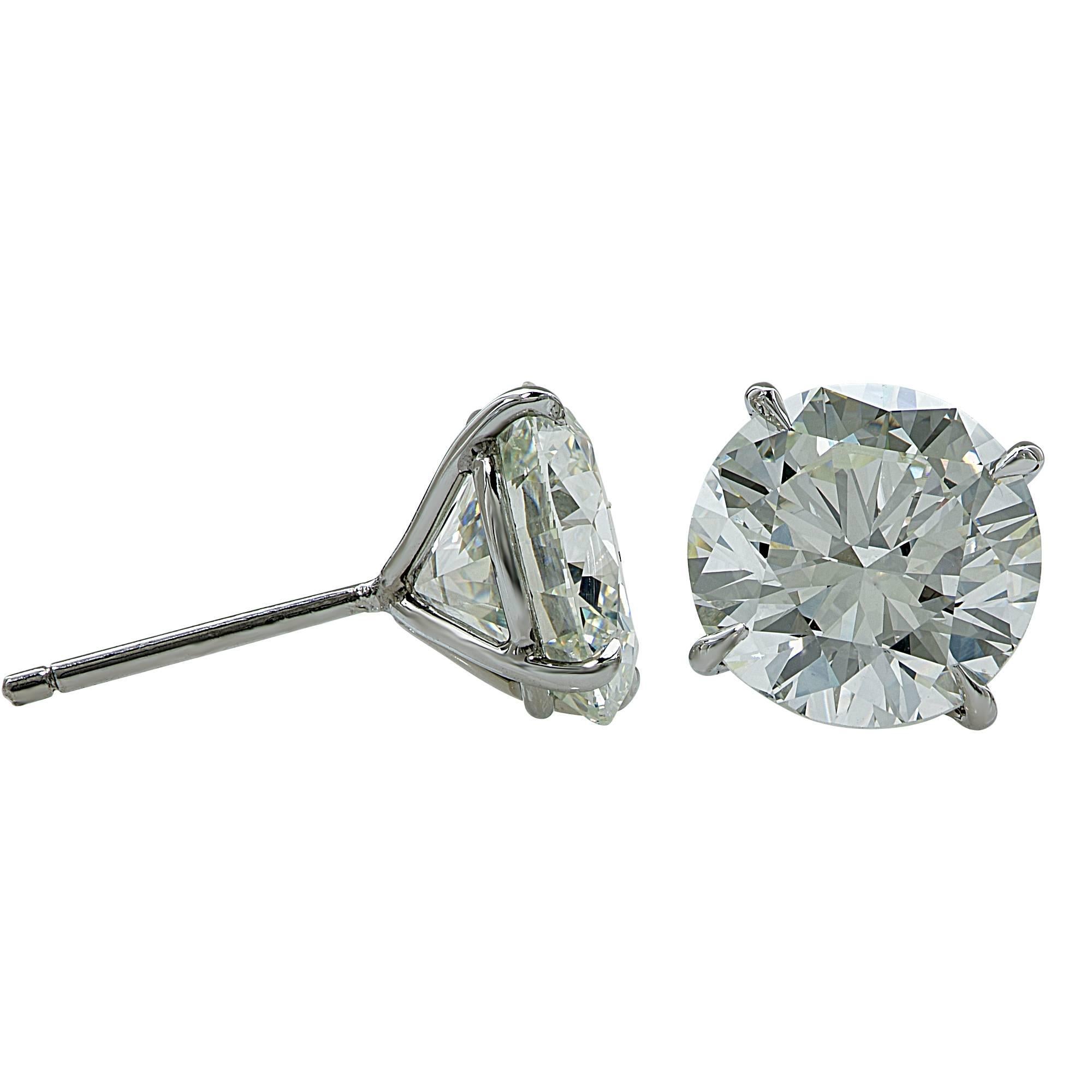 18k white gold stud earrings featuring 2 round brilliant cut diamonds weighing 6.03cts total, I-J color SI1 clarity. Both stones are GIA graded.

It is stamped and tested as 18k gold.
The metal weight is 1.58 grams.

These diamond earrings are