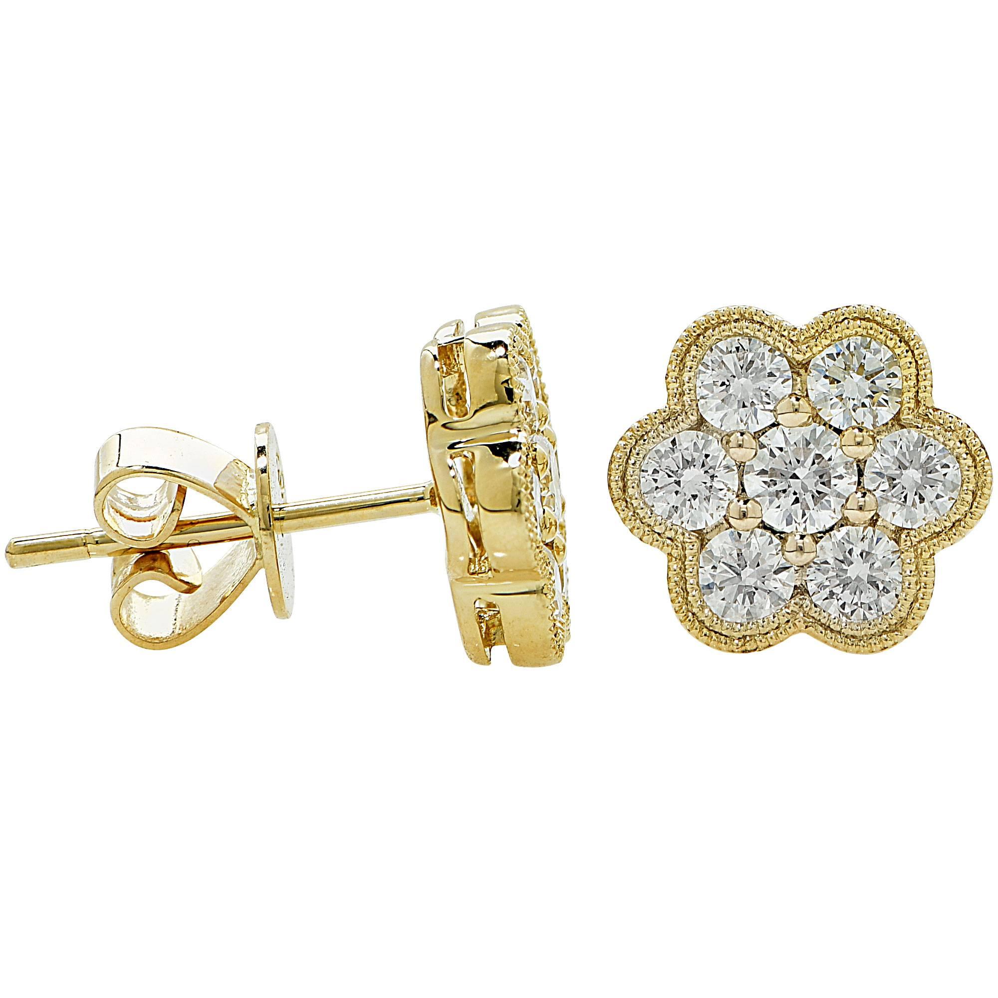 14k yellow gold cluster earrings featuring 14 round brilliant cut diamonds weighing 1ct total G color VS clarity.

It is stamped and tested as 14k gold.
The metal weight is 2.17 grams.

These diamond earrings are accompanied by a retail