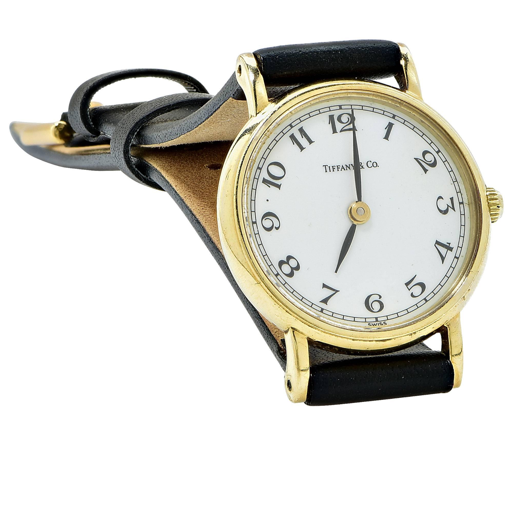 Tiffany & Co. 14k yellow gold watch.

It is stamped and tested as 14k gold.
The metal weight is 13.83 grams.

This Tiffany & Co. watch is accompanied by a retail appraisal performed by a GIA Graduate Gemologist.