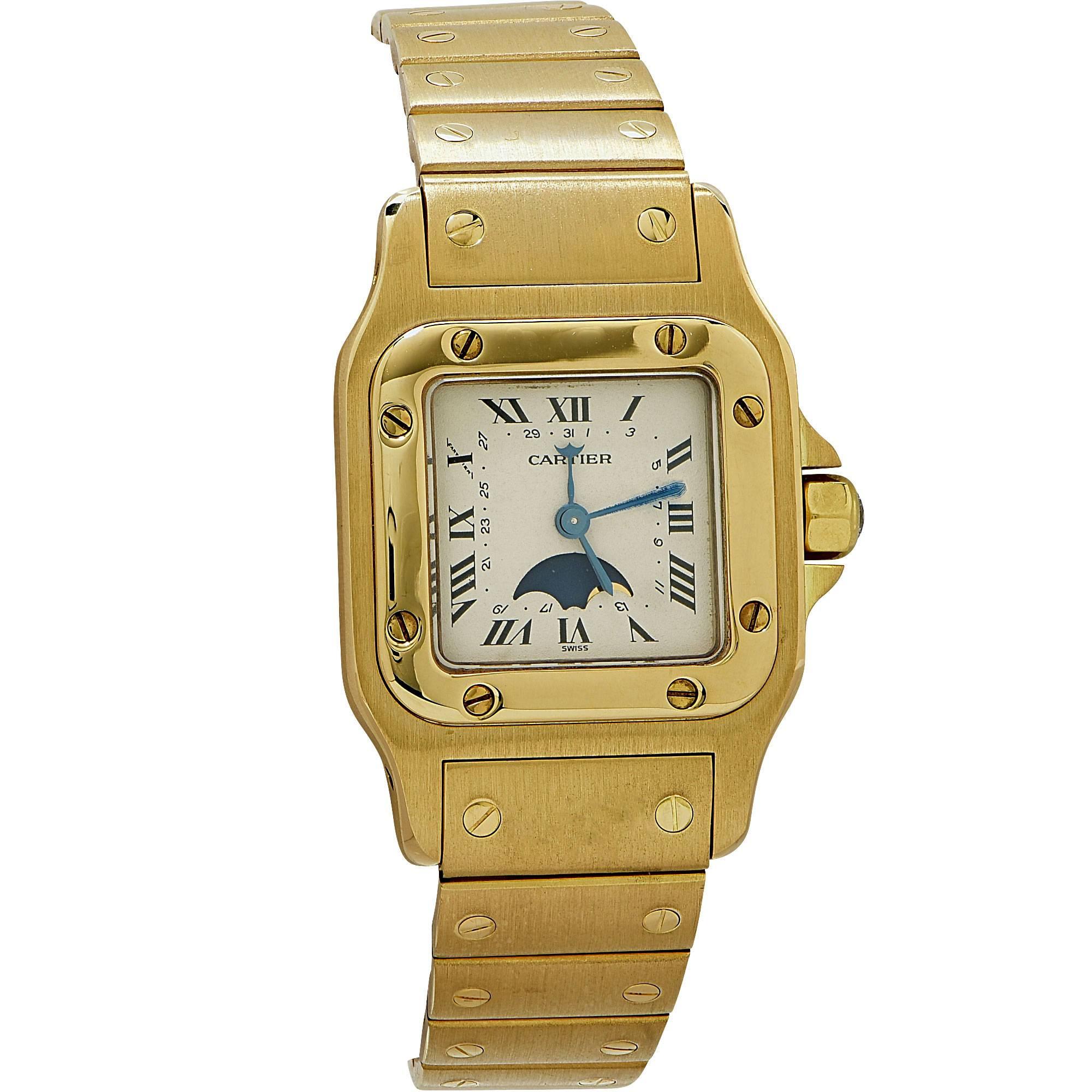 18k yellow gold Cartier Santos watch with original box.

It is stamped and tested as 18k gold.
The metal weight is 85.99 grams.

This Cartier watch is accompanied by a retail appraisal performed by a GIA Graduate Gemologist.