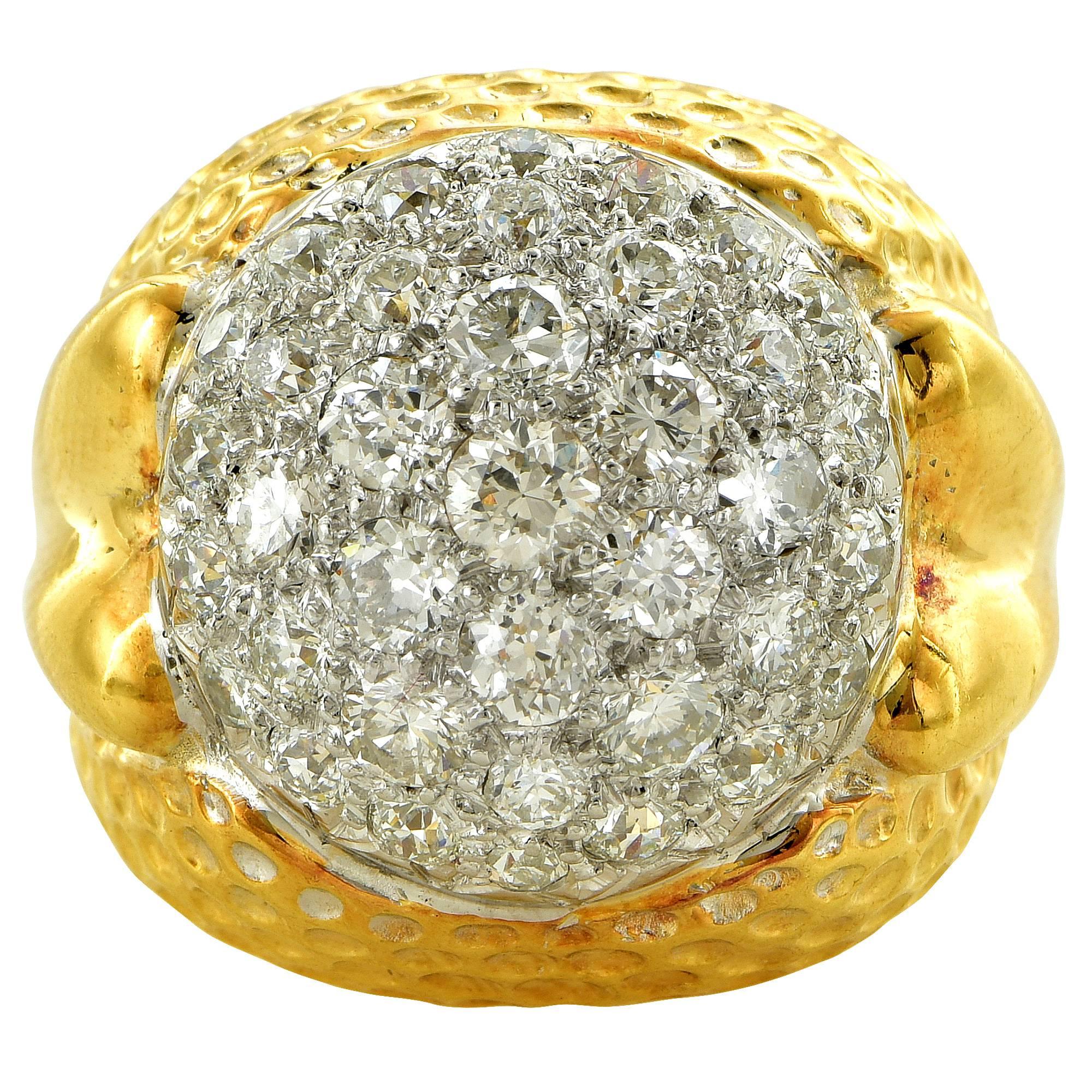 18k white and yellow gold domed ring featuring 38 Round brilliant cut diamonds weighing approximately 3.50cts F-G color and VS-SI clarity.

This beautiful ring is a size 6.5 and can be sized up or down.
It is stamped and/or tested as 18k gold.
The