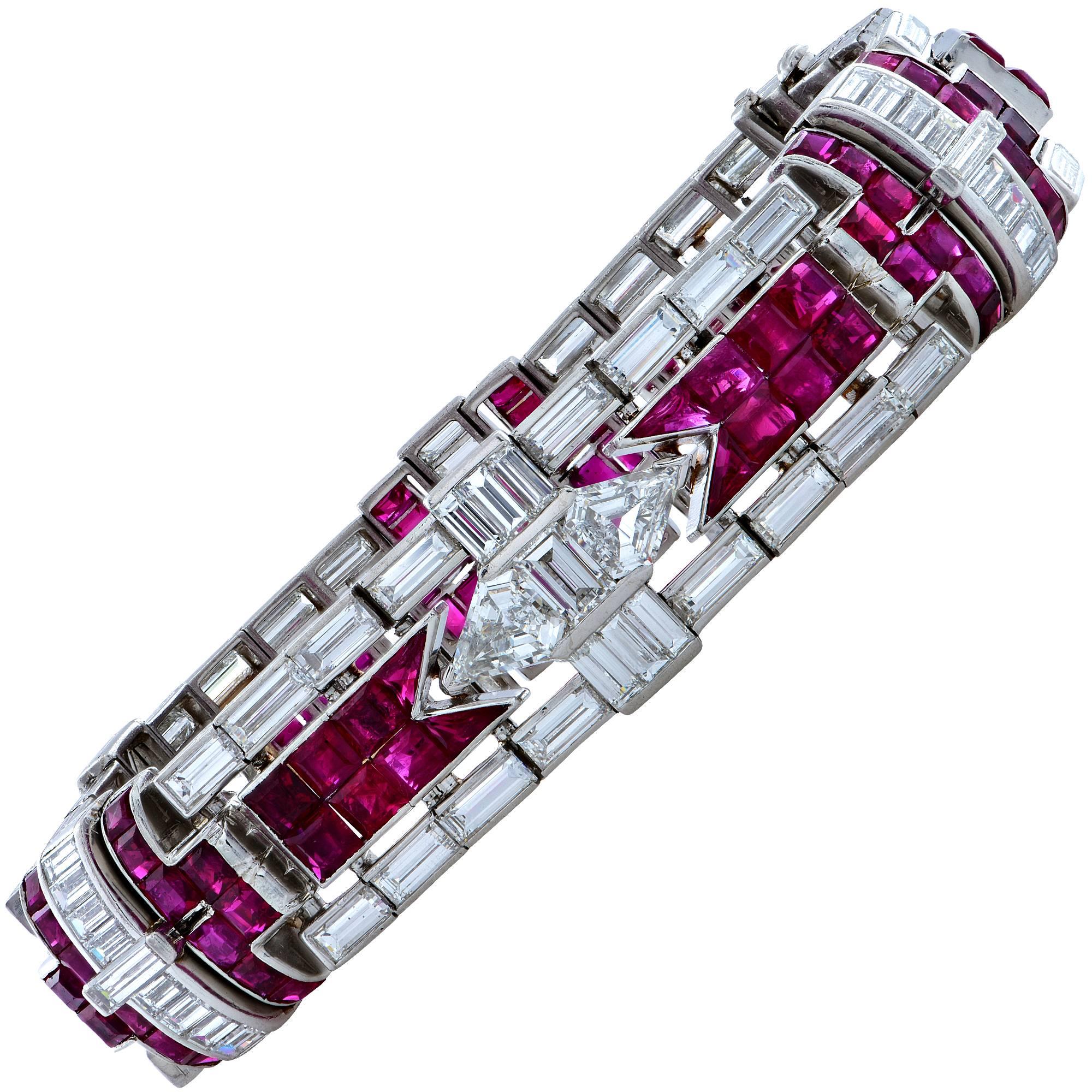 Platinum Art Deco bracelet stamped OCT.31-1922 featuring 96 Custom cut Rubies weighing approximately 22cts, the vast majority being unheated with a Burma origin. There are 94 straight baguette diamonds weighing approximately 18cts D-F color and