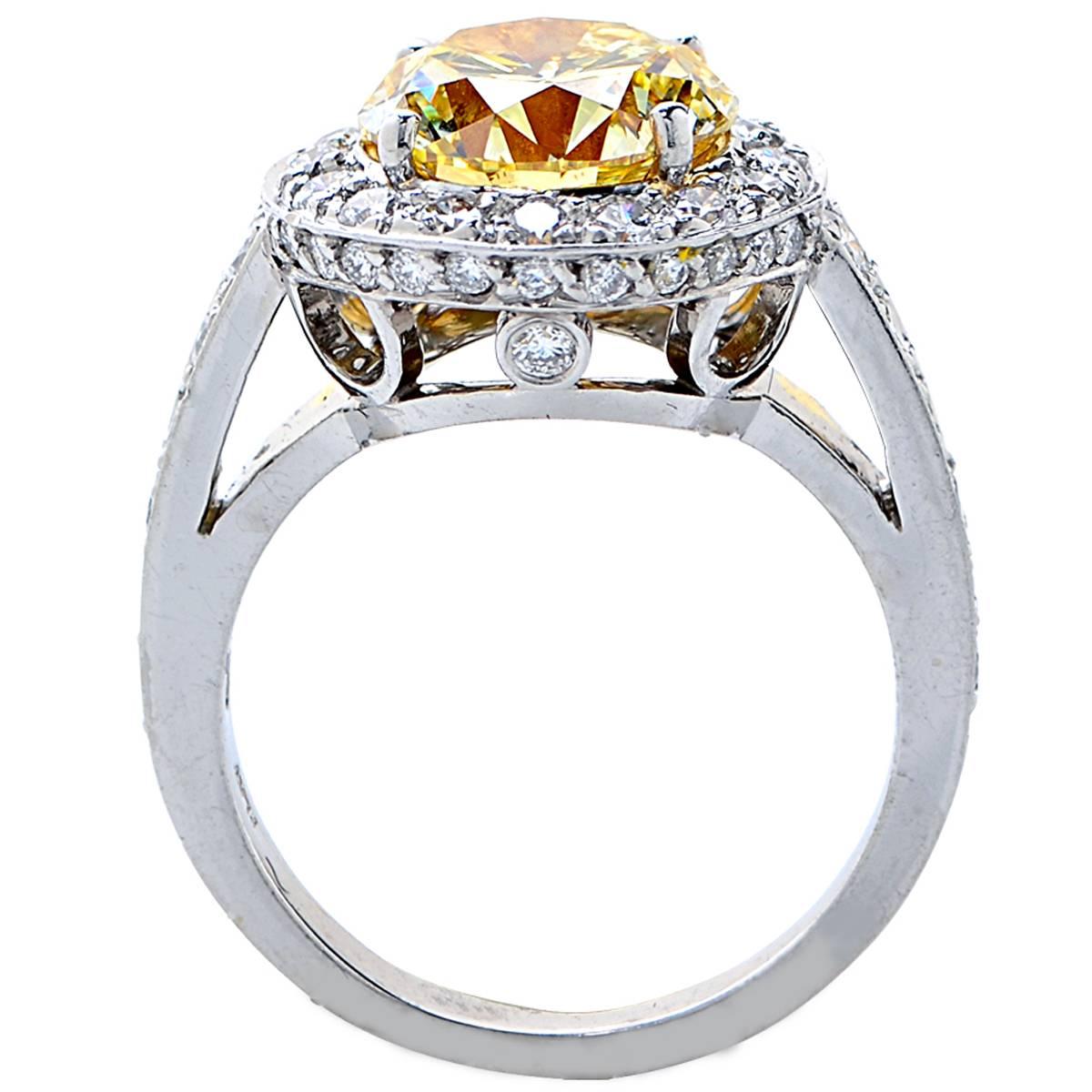 Women's 3.36 Carat GIA Graded Fancy Yellow Diamond Platinum Engagement Ring For Sale
