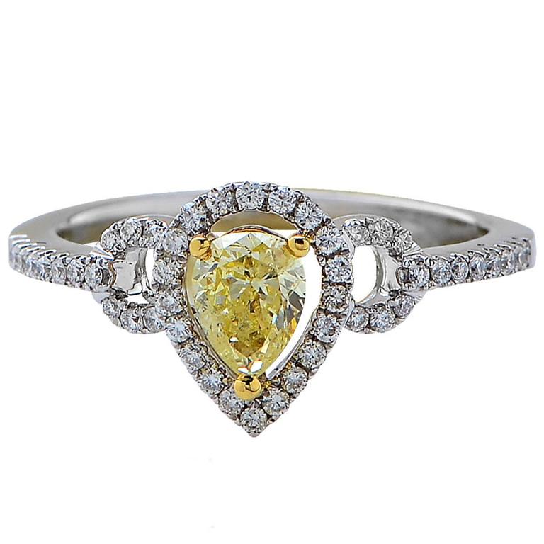 .48 Carat GIA Graded Fancy Yellow Diamond Halo Engagement Ring at 1stdibs